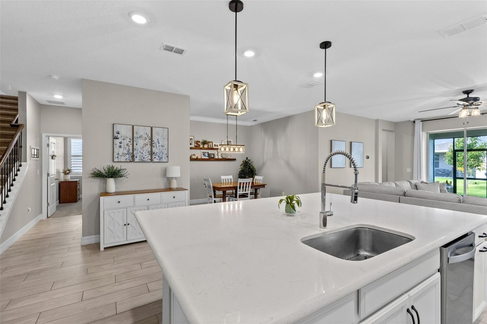 Designer kitchen opens to dining area and family room - 1274 SILO DR, ST CLOUD