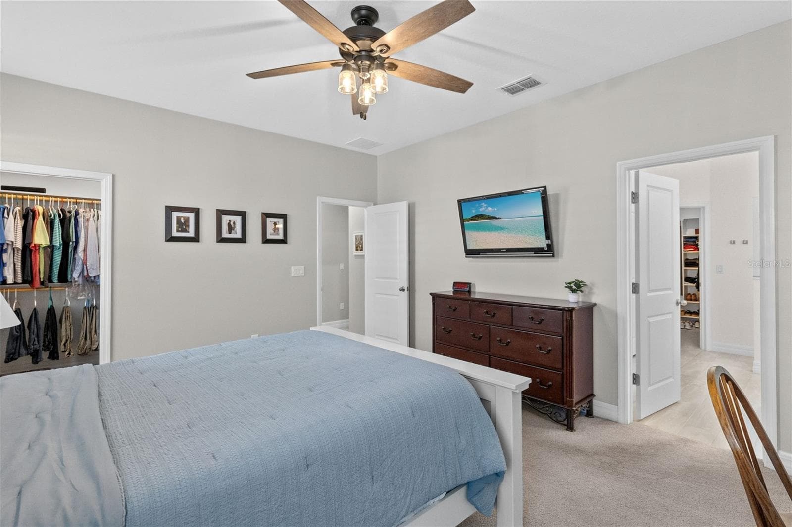 Primary Bedroom features 2 large custom walk in closets - 1274 SILO DR, ST CLOUD