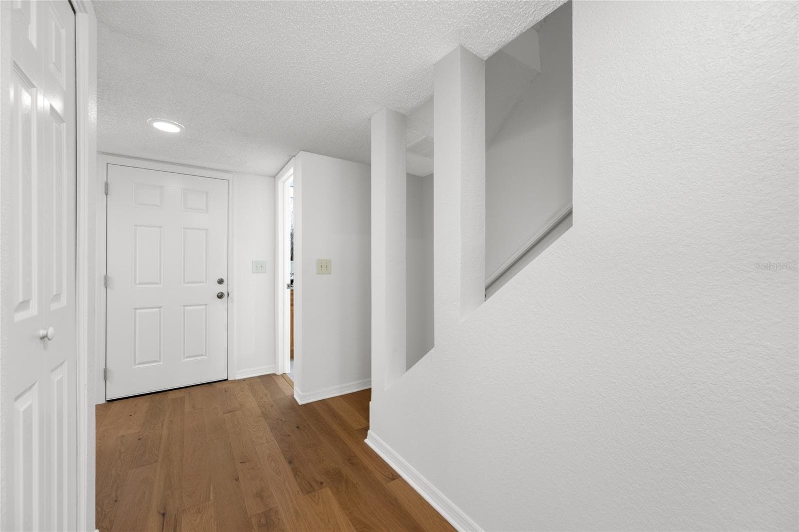 Staircase to upstairs bedrooms. - 2467 KINGFISHER LN #101H, CLEARWATER