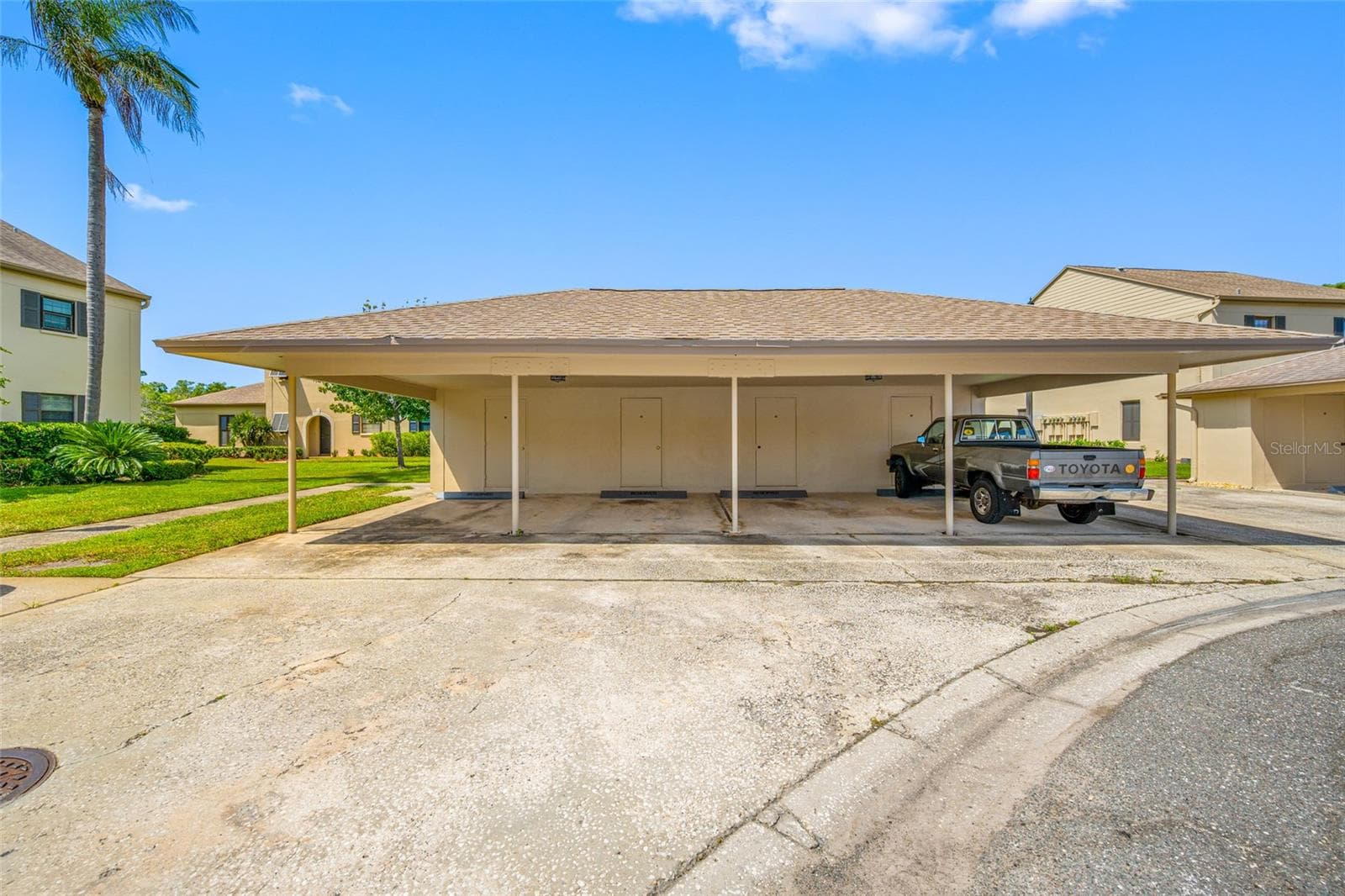Covered parking space and storage - 2467 KINGFISHER LN #101H, CLEARWATER