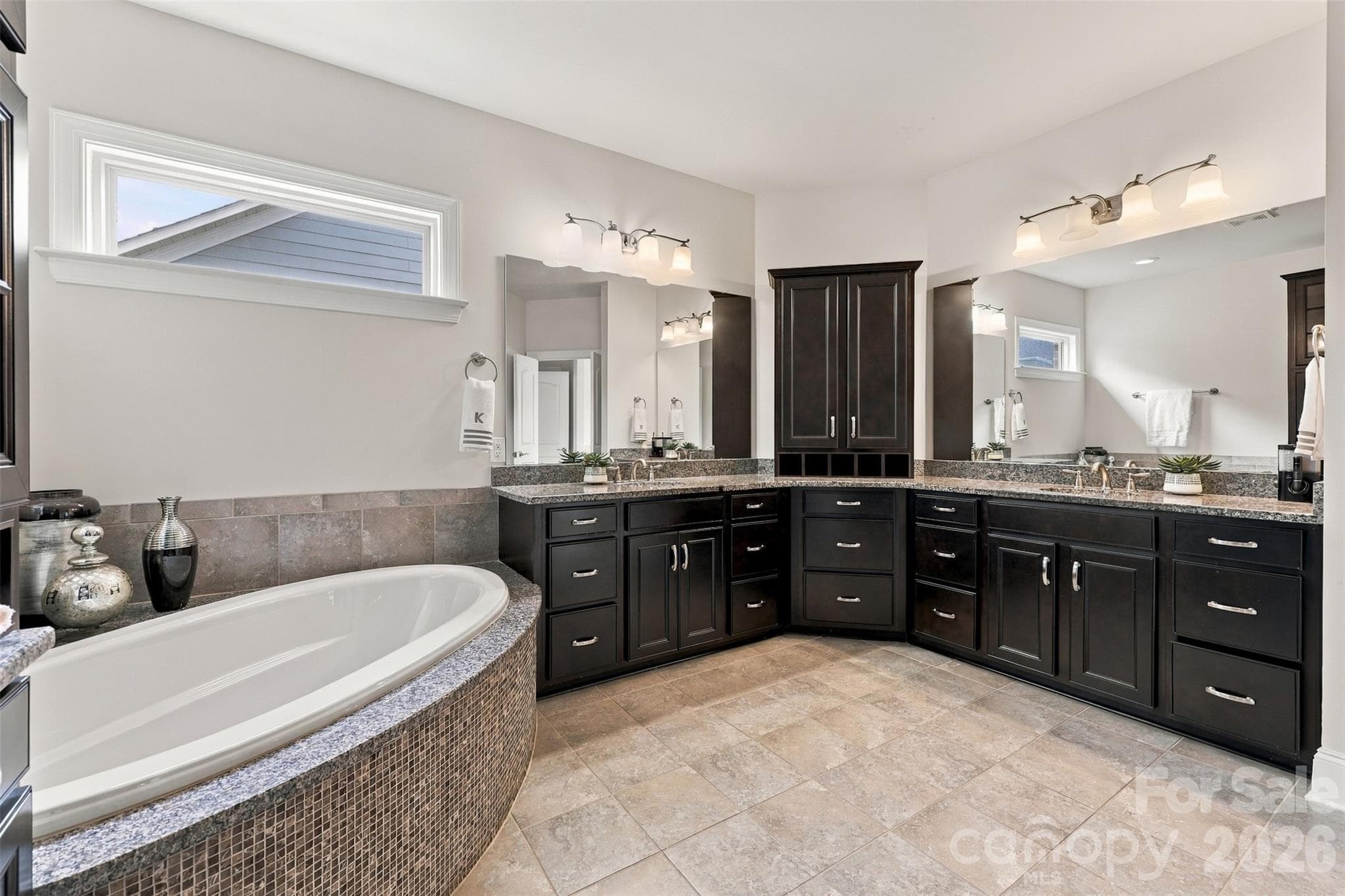 primary bathroom, his and hers sinks, ample cabinet space, garden tub, walk in shower - 131 Reserve Lane, Indian Land