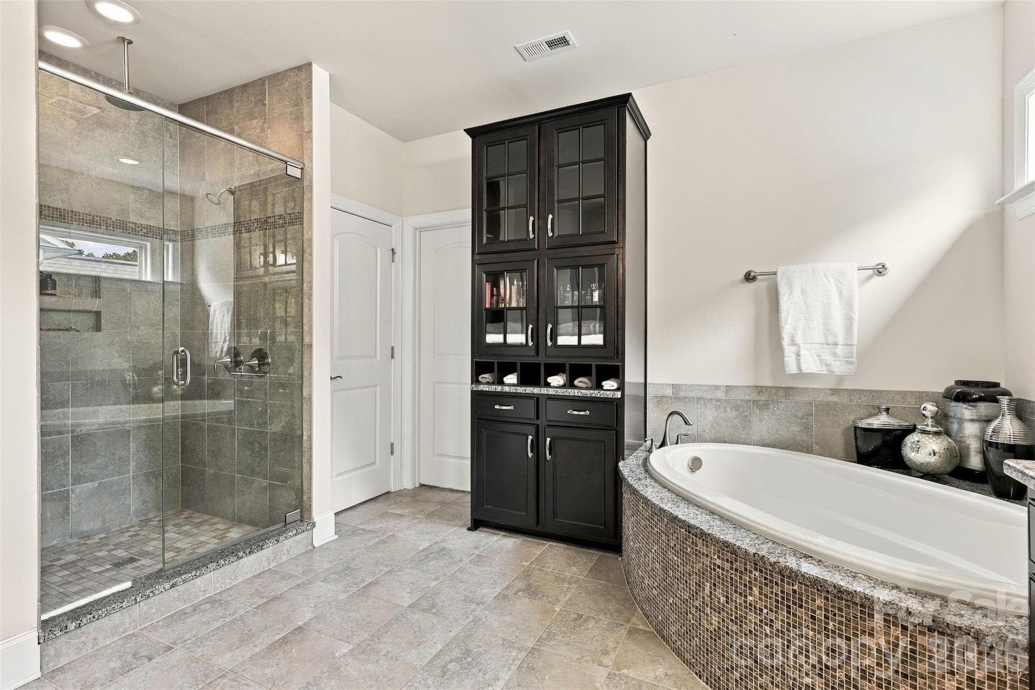 primary bathroom, his and hers sinks, ample cabinet space, garden tub, walk in shower - 131 Reserve Lane, Indian Land