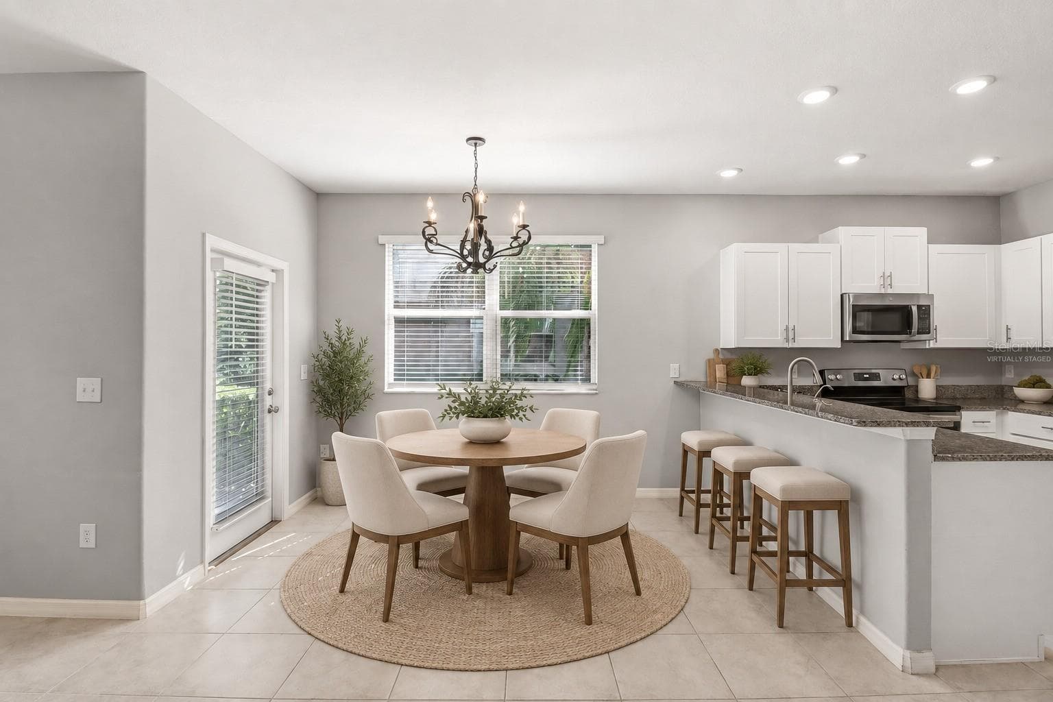 Virtually Staged Eat in Kitchen - 9536 PEMBROOKE PINES DR, SUN CITY CENTER