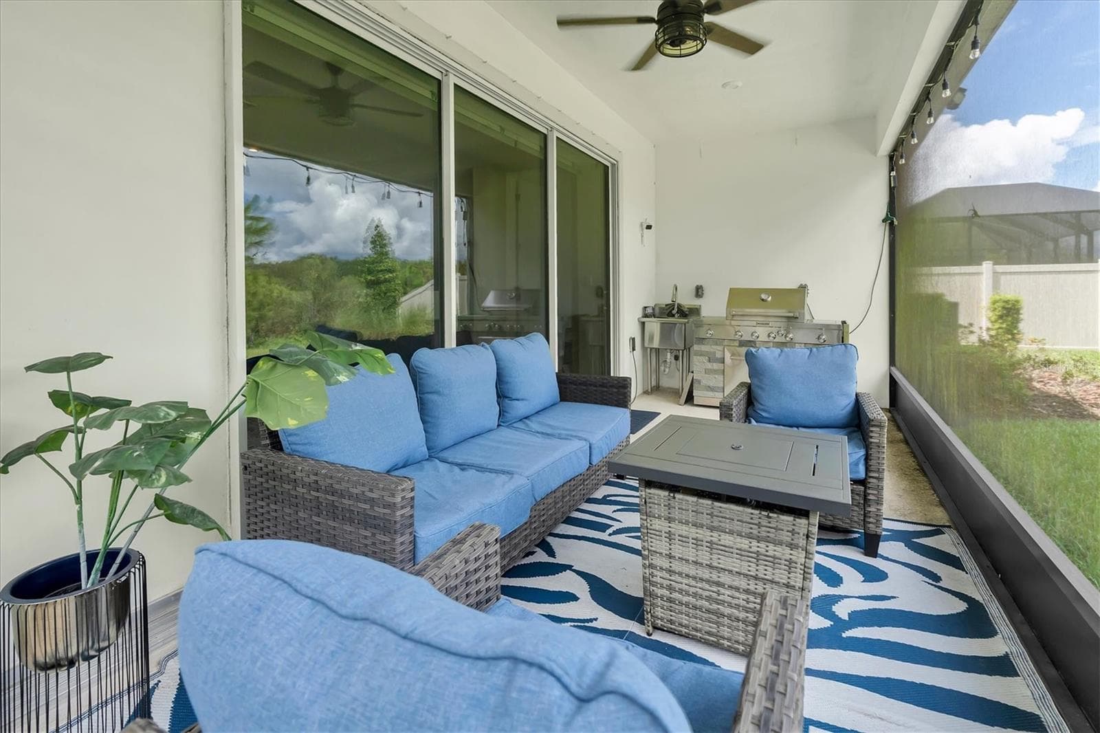 SPACIOUS SCREENED LANAI WITH PANO SCREEN - 13659 STANSIL AVE, ODESSA