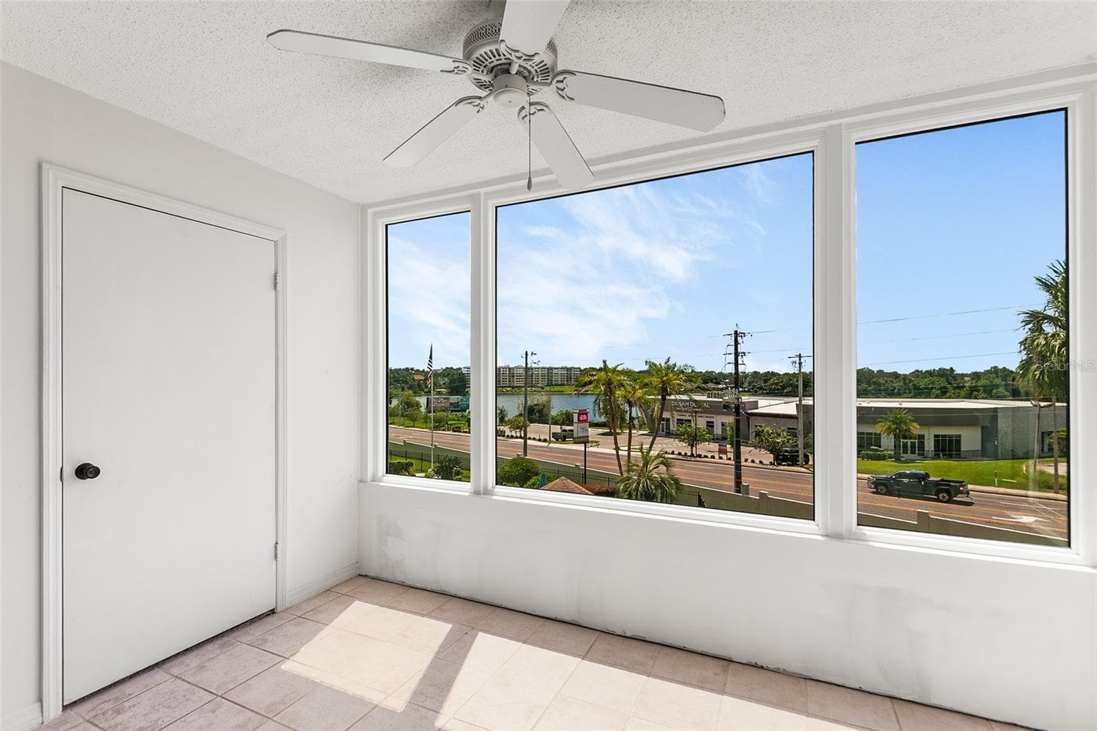 BONUS ROOM WITH VIEW TOWARDS LAKE. STORAGE CLOSET ON LEFT - 1776 6TH ST NW #304, WINTER HAVEN