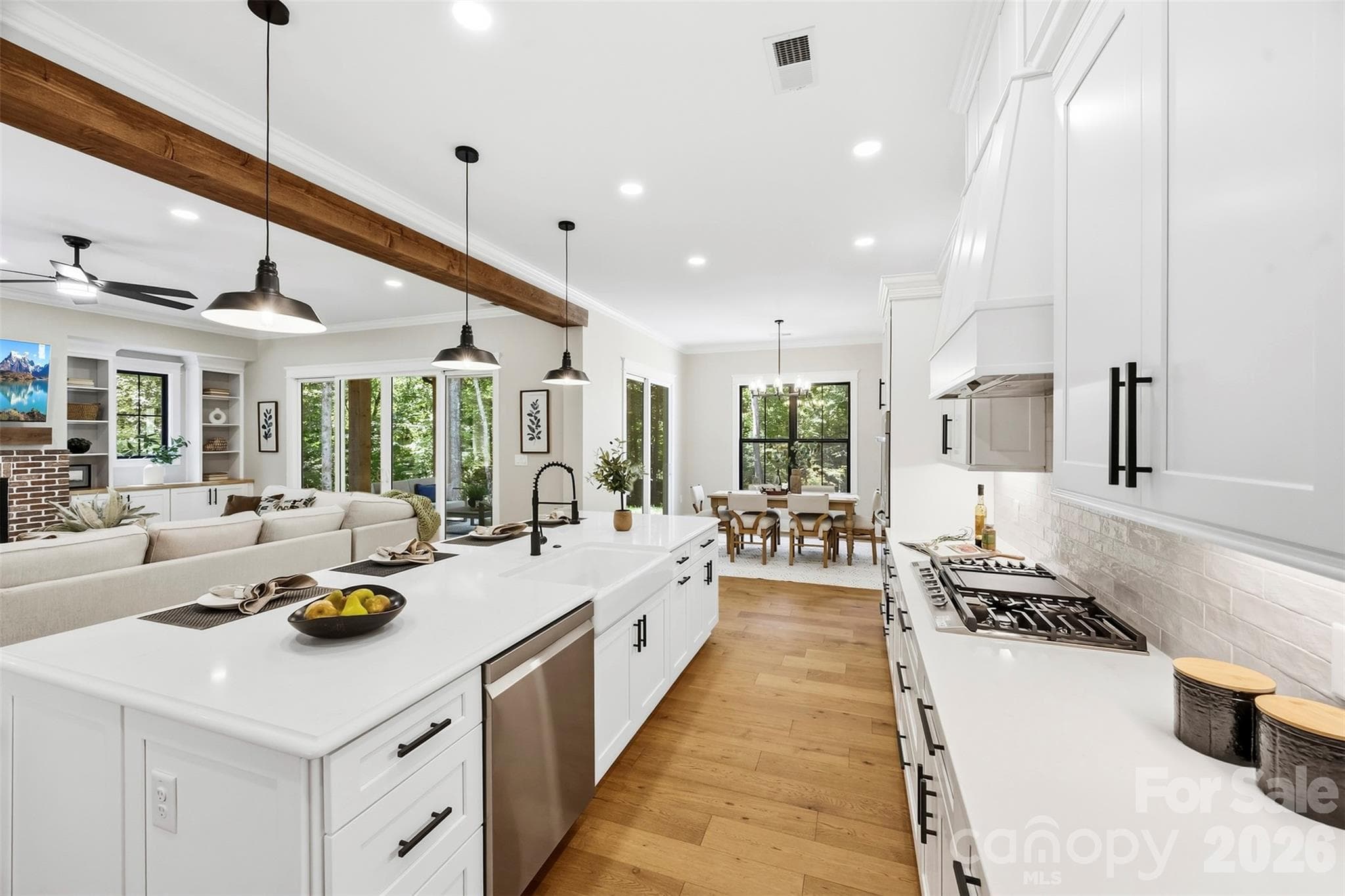 Kitchen island with seating for four, dishwasher, and quartz counter tops. - 3515 Capricorn Road, Lancaster