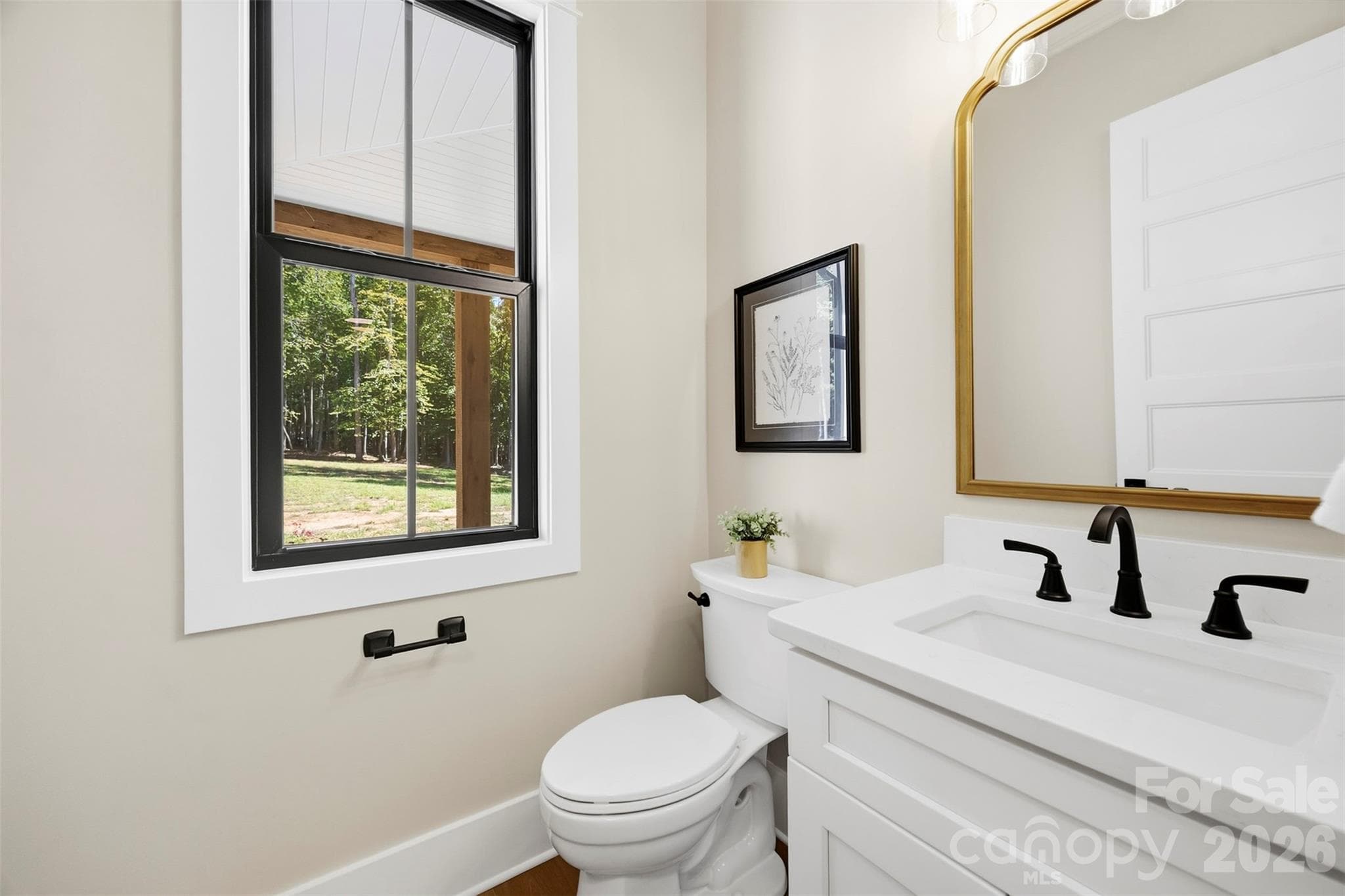 Powder room off of mudroom hallway. - 3515 Capricorn Road, Lancaster