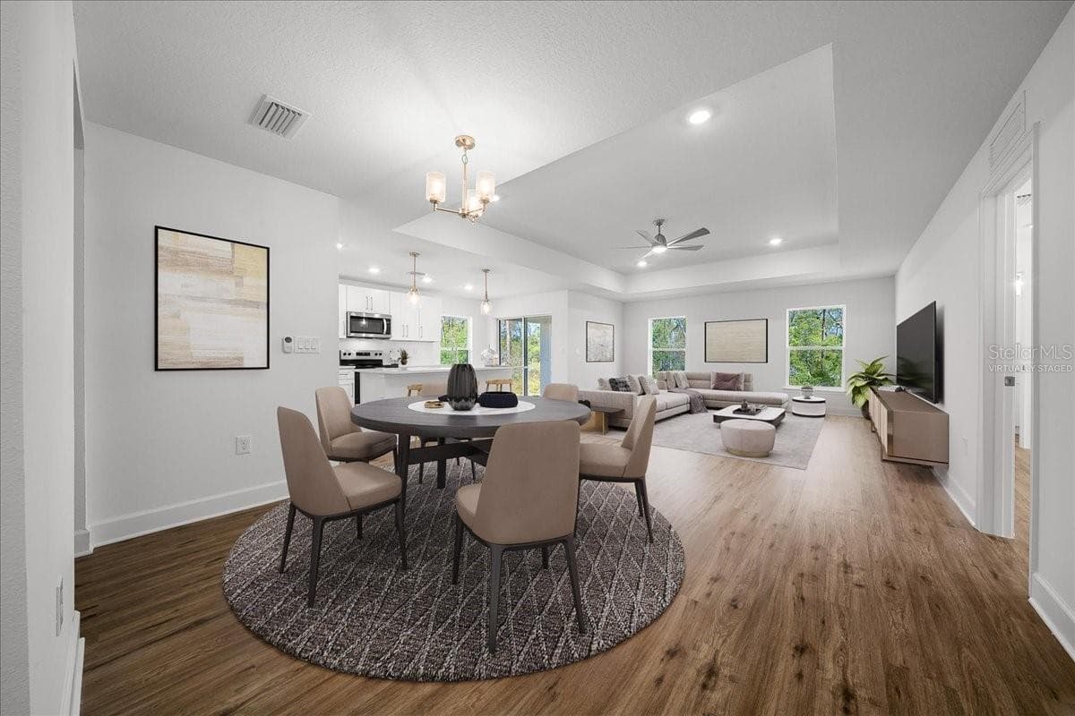 Virtually Staged Dining & Living Area - 6241 FREEPORT DR, SPRING HILL
