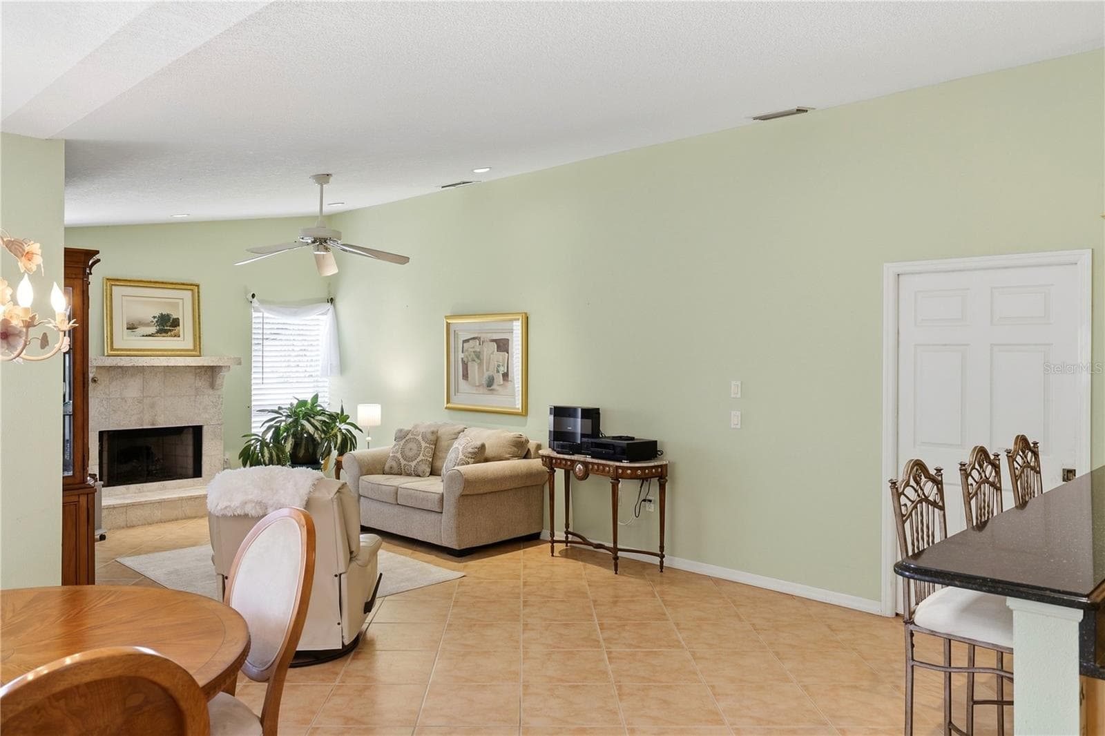 Family room with gas fireplace - 1252 ROYAL TERN DR, PUNTA GORDA