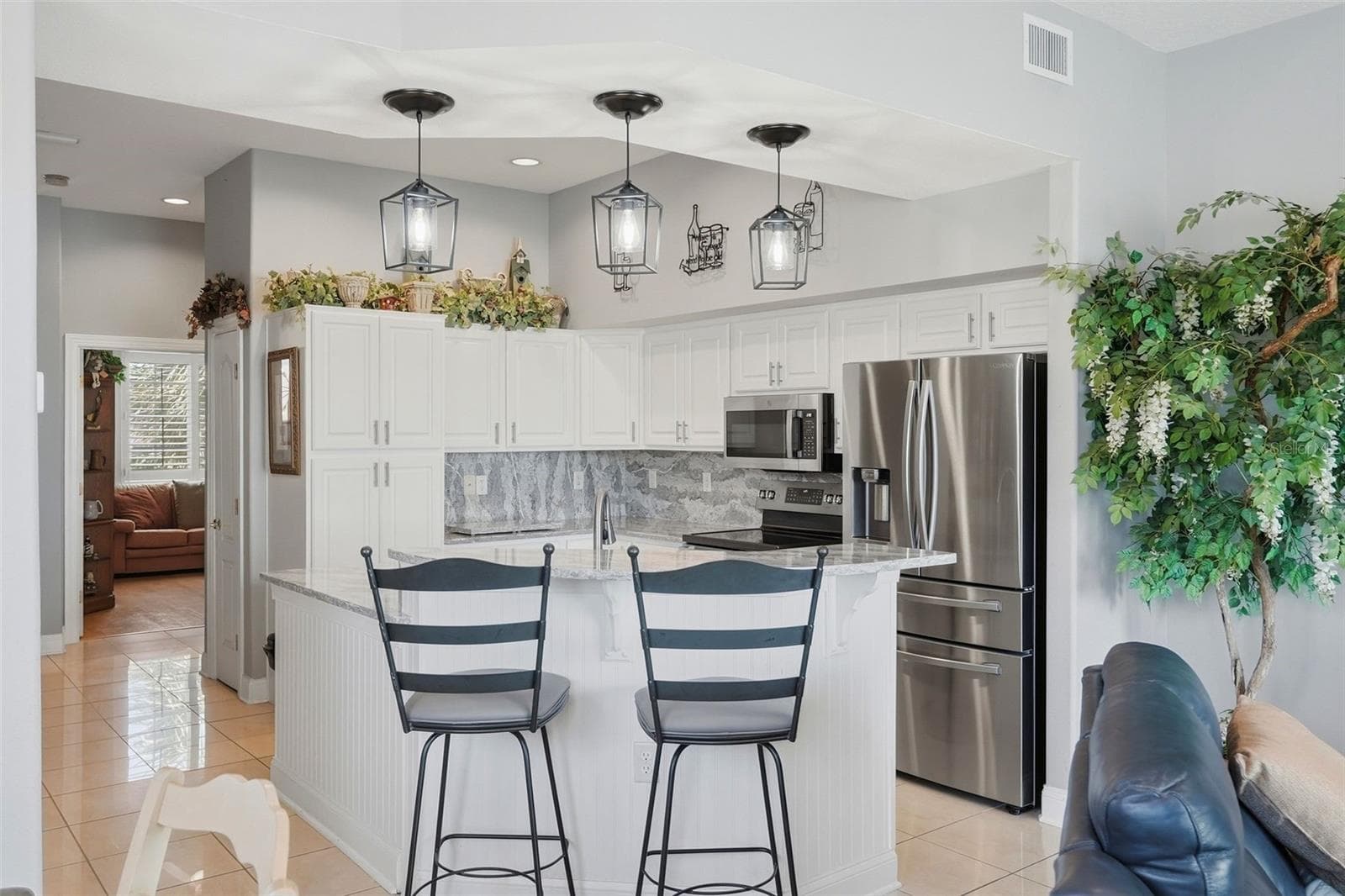Walk past the kitchen to a spacious bedroom currently being used as an office. - 200 BRIGHTWATER DR #10, CLEARWATER BEACH