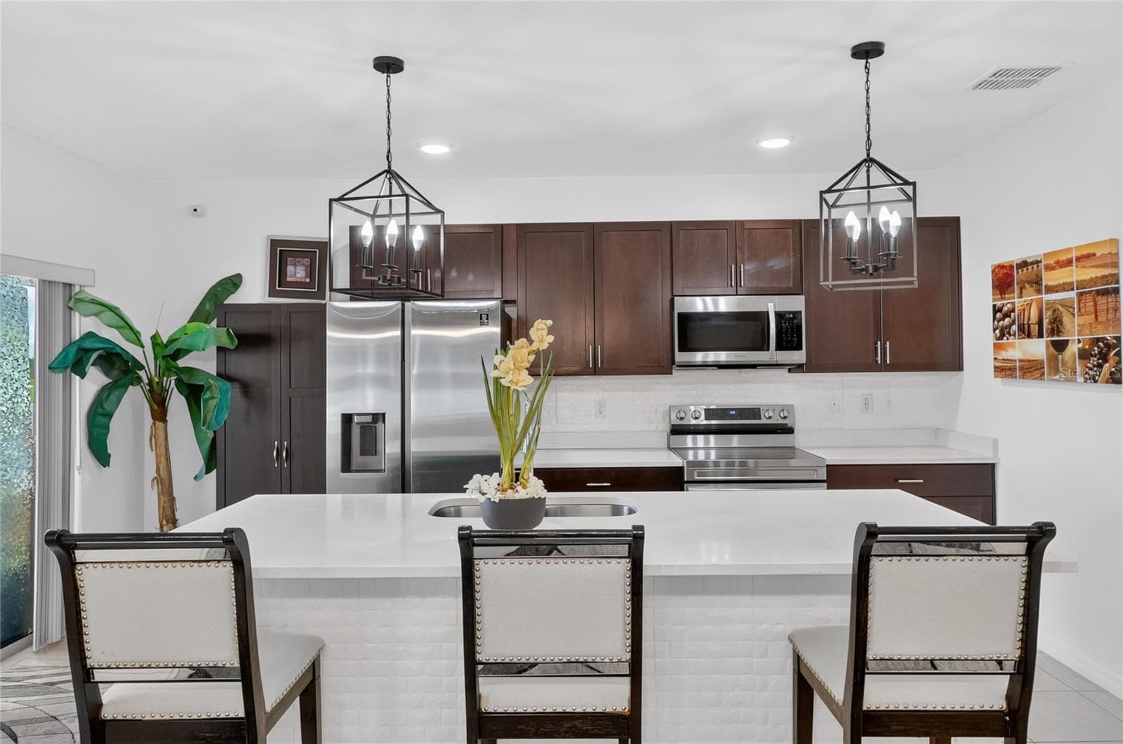 Love the large kitchen island that is made of marble according to the owner - 456 ADRIEL AVE, WINTER HAVEN