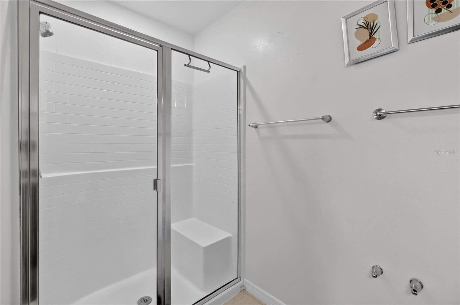 Nice walk in shower with bench - 456 ADRIEL AVE, WINTER HAVEN