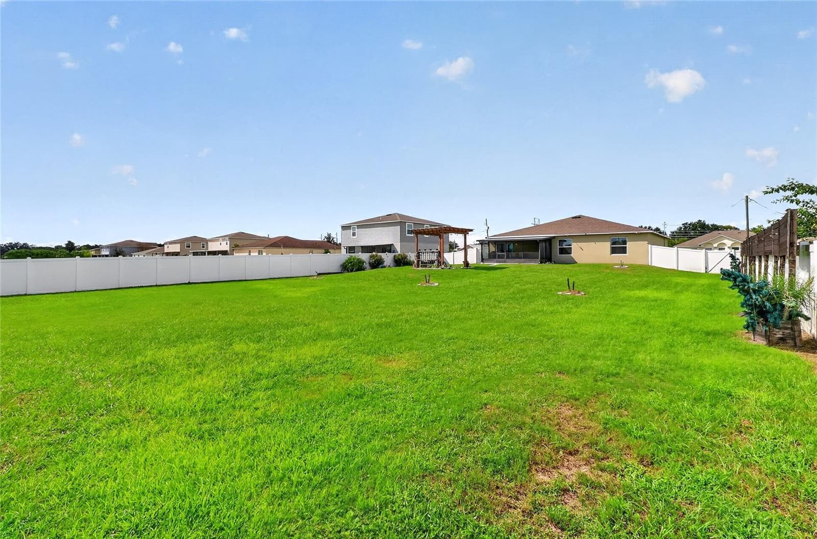 View of the home from the backyard - 456 ADRIEL AVE, WINTER HAVEN