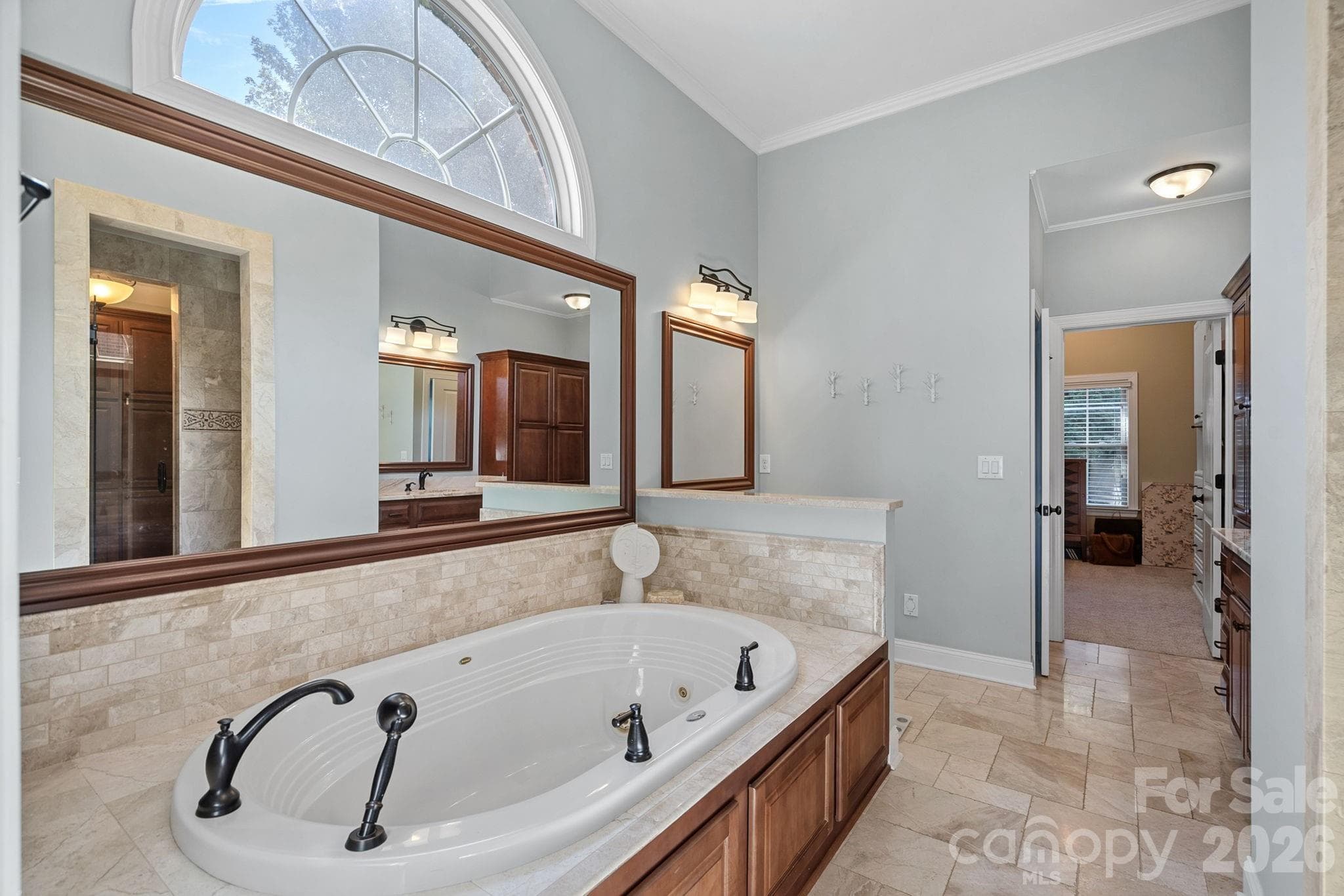 Large Primary Bathroom is actually two full bathrooms connected. - 1104 Longwood Court, Matthews