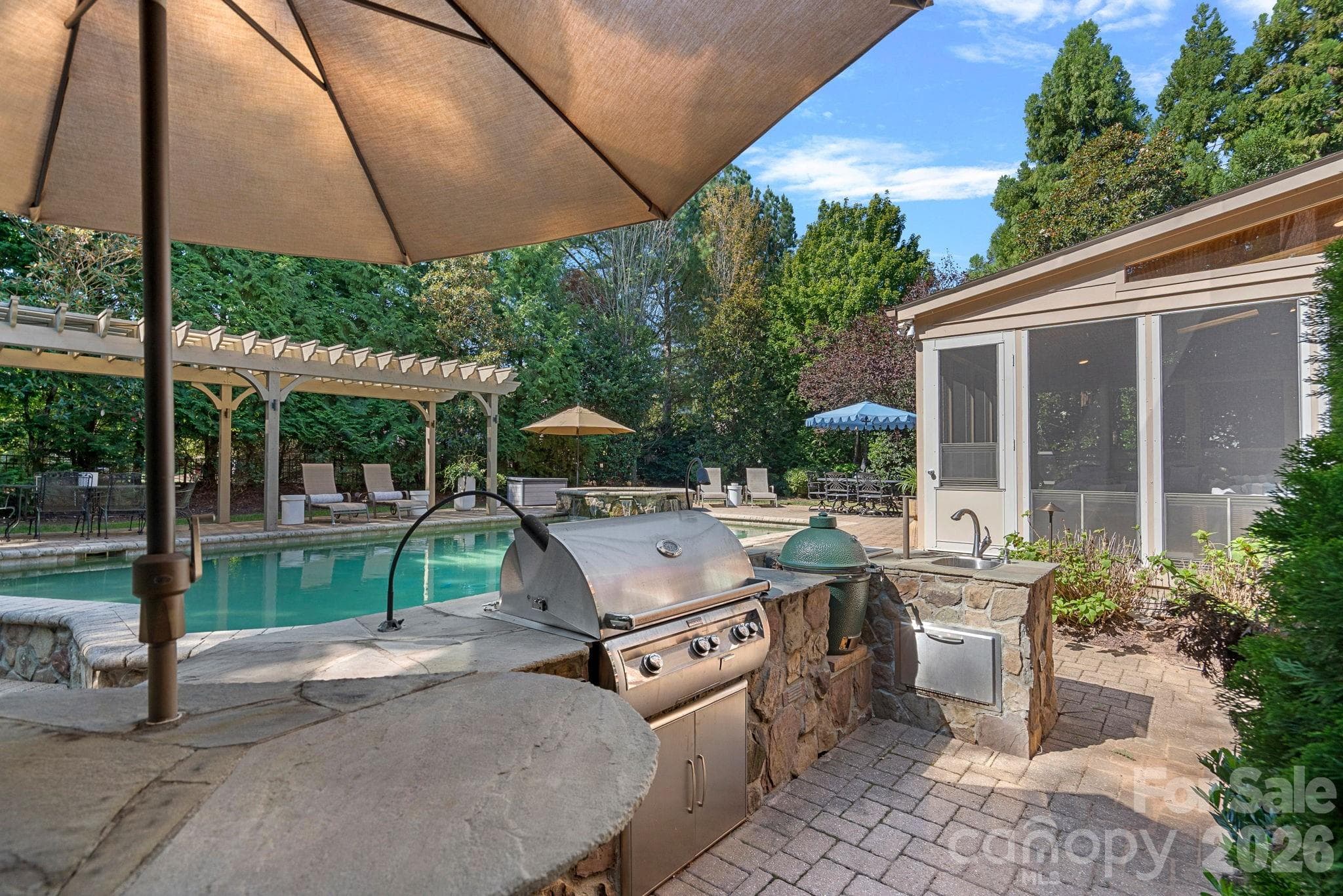 Outdoor kitchen is ready for grilling. - 1104 Longwood Court, Matthews