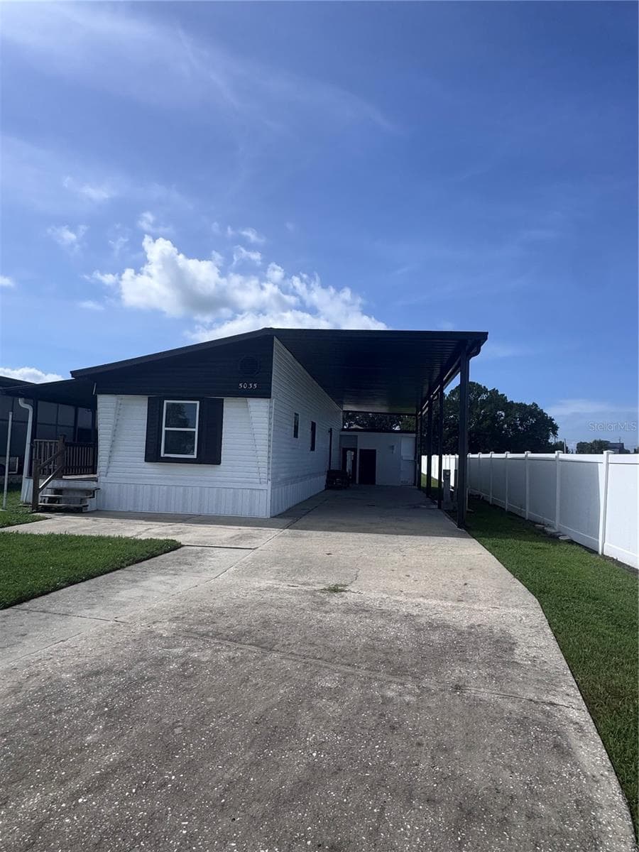 Manufactured Home at 5035 SOUTHSHORE DR, POLK CITY, photo 2 of 34