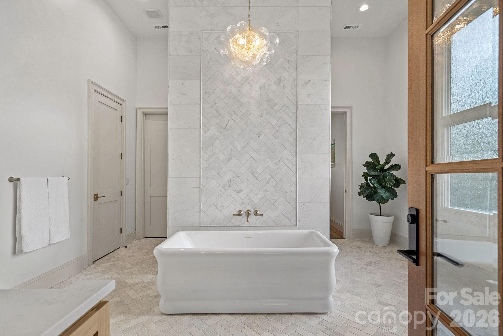 upstairs primary bath - 7679 Rabbit Circle, Denver