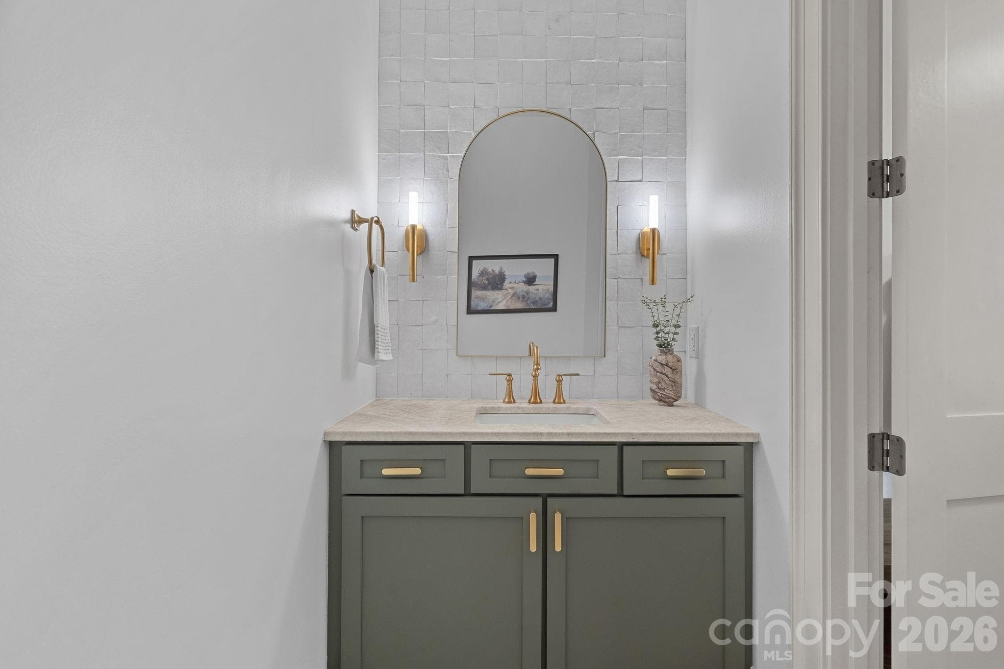 half bathroom off of mudroom - 7679 Rabbit Circle, Denver