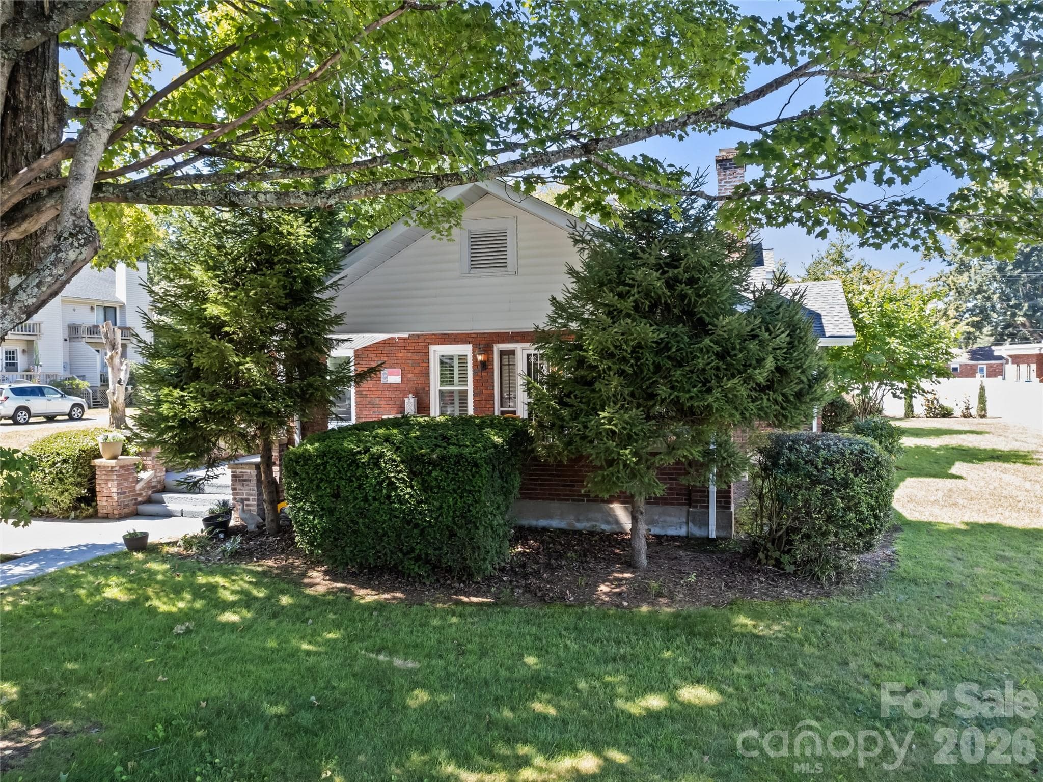 Brick home front yard - 50 Epsom Street, Waynesville