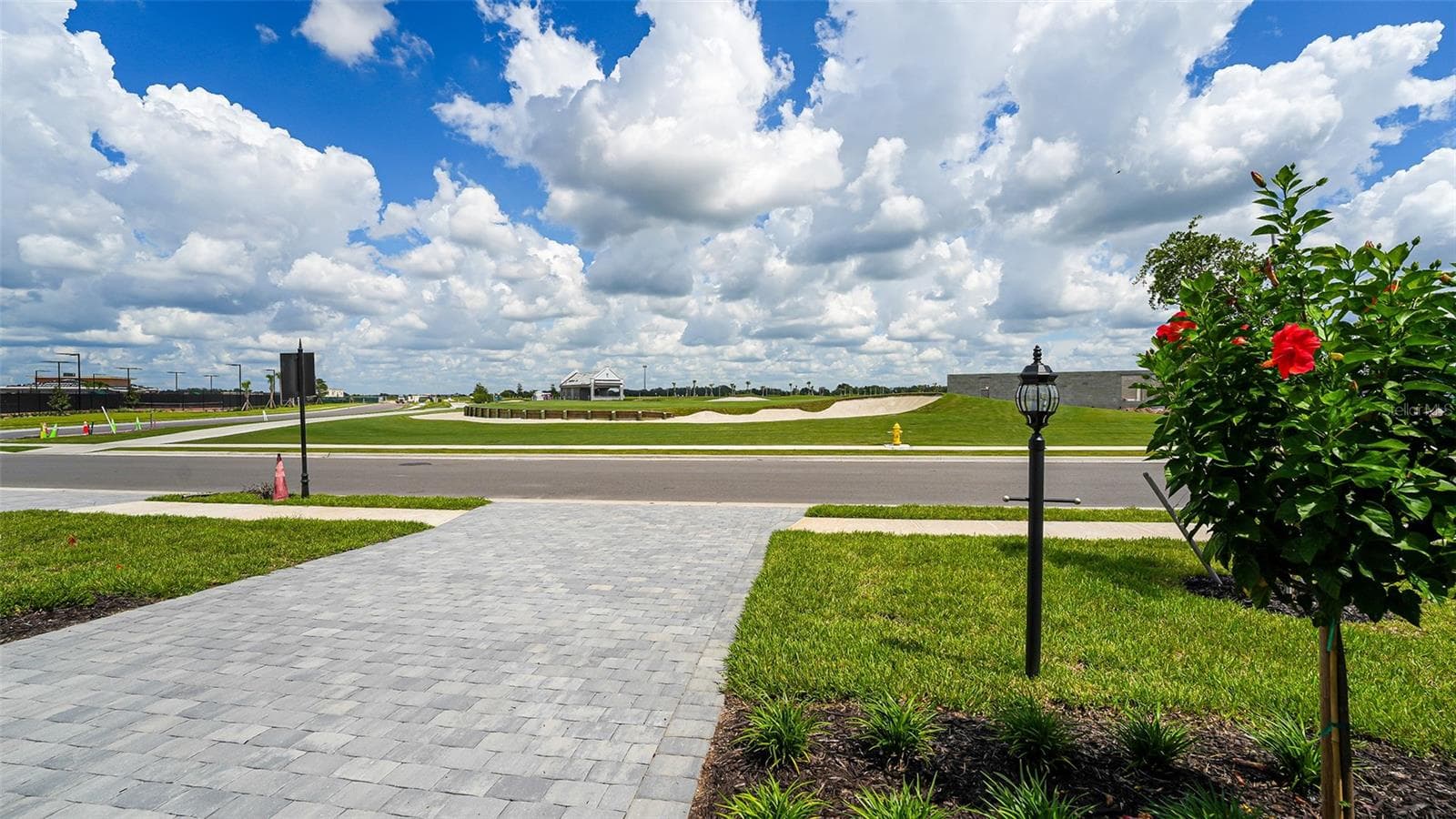 Golf Course Front Yard View. Clubhouse Under Construction on Left Side of Picture - 19618 CONCH DR, LAKEWOOD RANCH