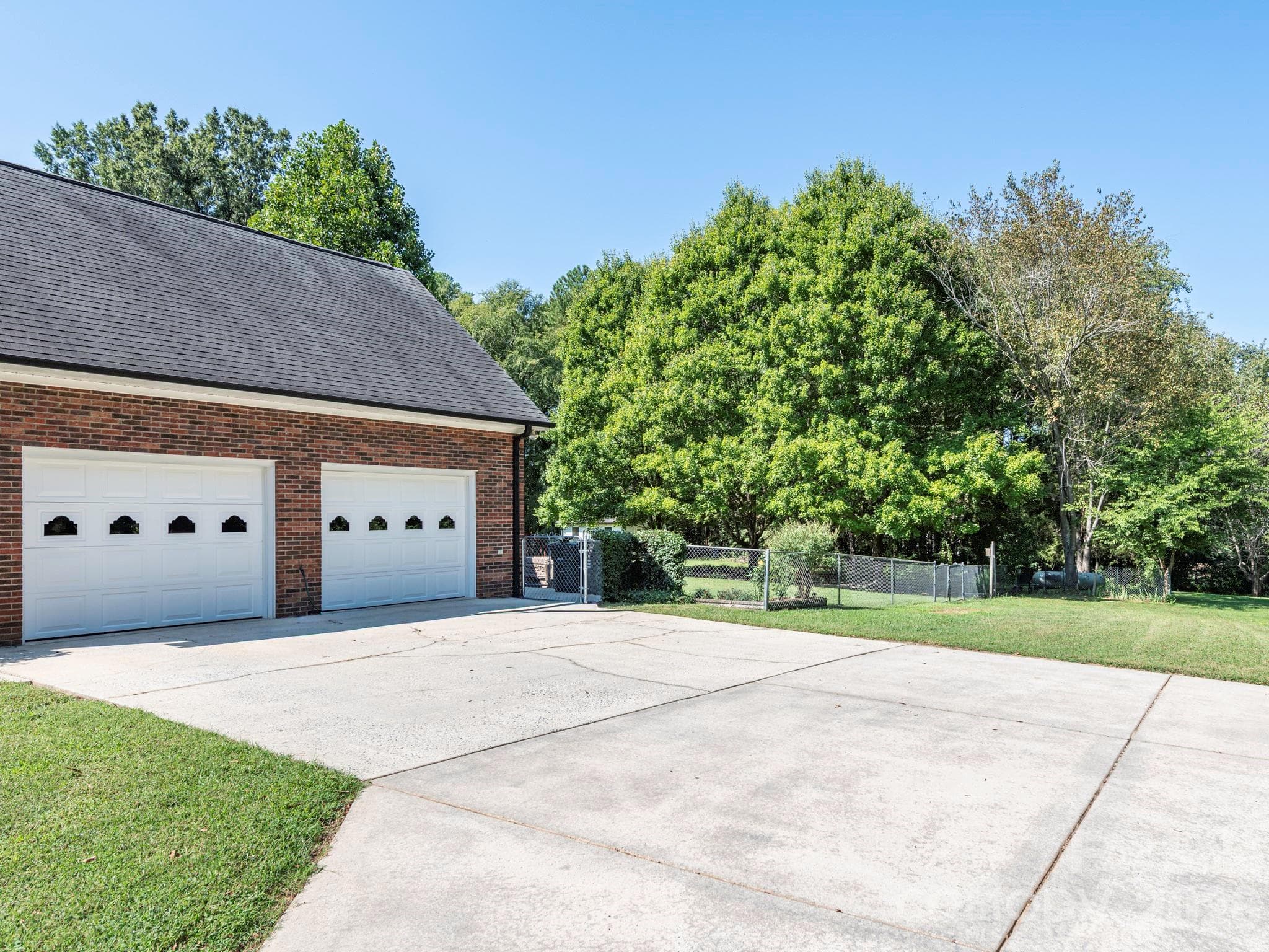 oversized driveway next to garage - 2434 Plantation Road NW, Concord