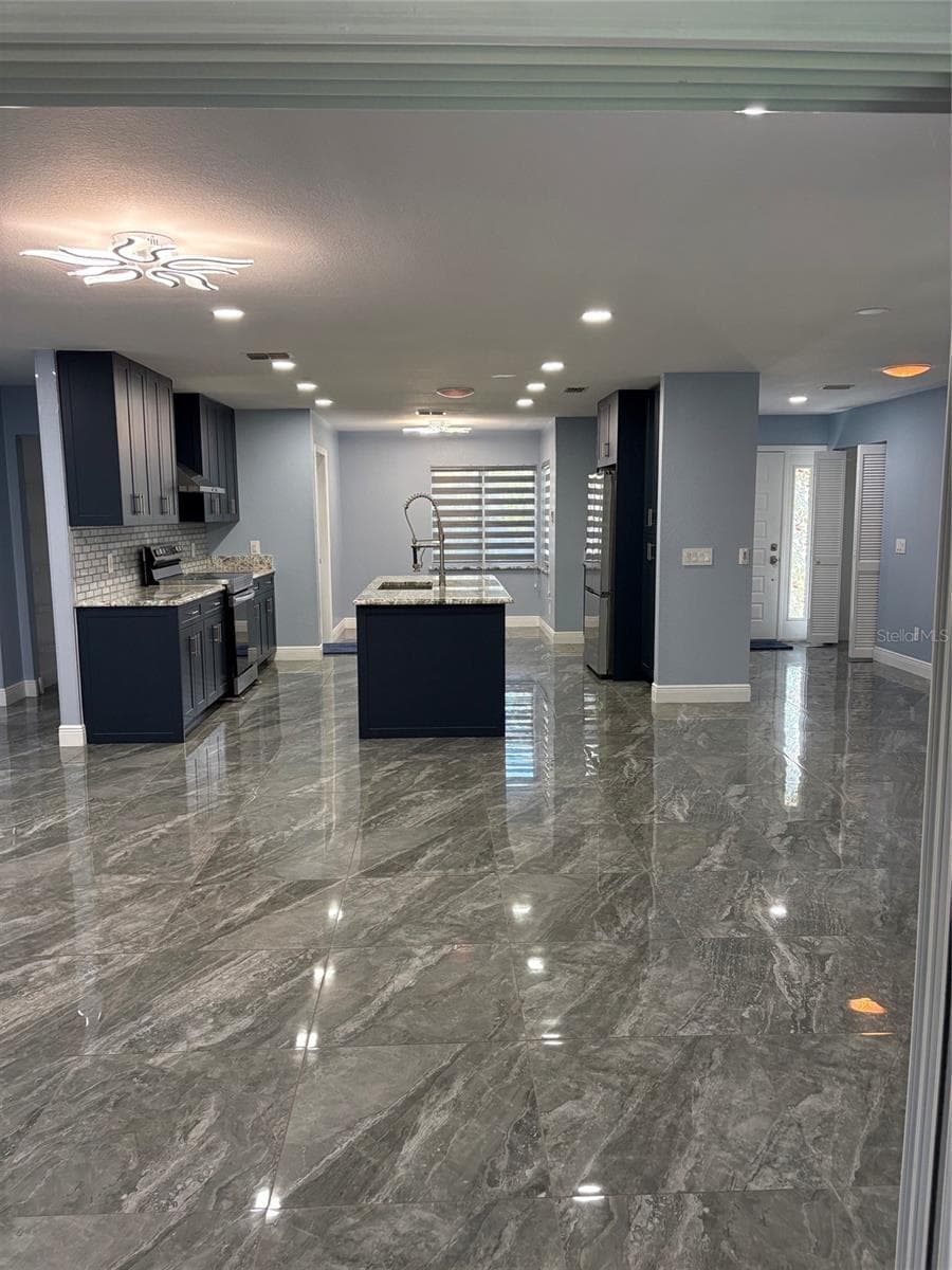 Great room view of entry - 19005 SW 98TH LOOP, DUNNELLON