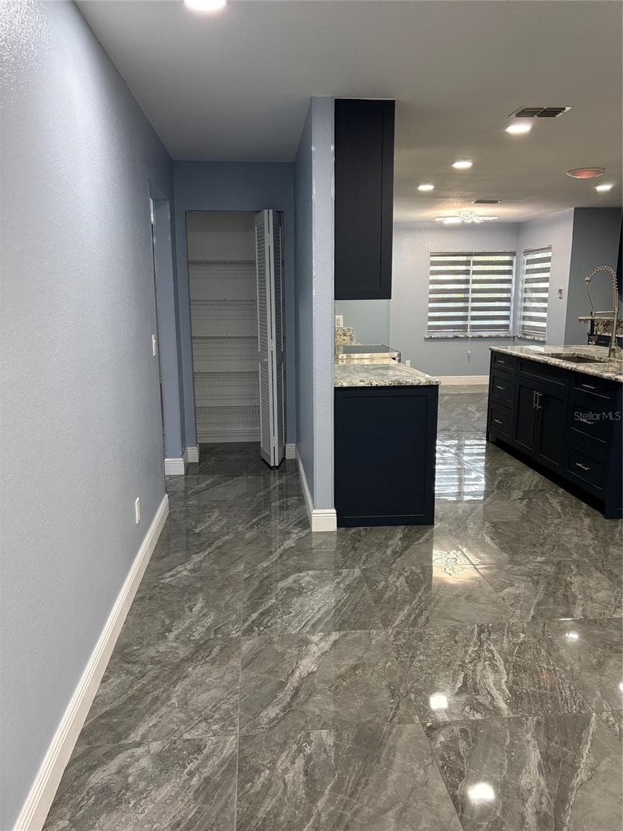 Looking into entry to guest bedrooms - 19005 SW 98TH LOOP, DUNNELLON
