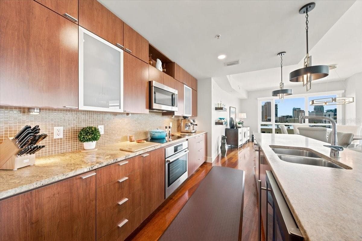 Abundant cabinetry provides excellent storage for everyday functionality. - 111 N 12TH ST #1704, TAMPA