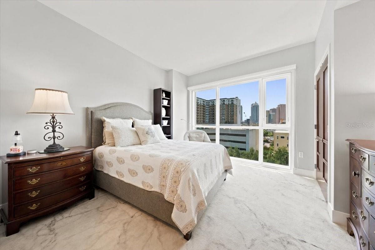 Spacious additional bedroom offers comfortable accommodations for guests or family. - 111 N 12TH ST #1704, TAMPA