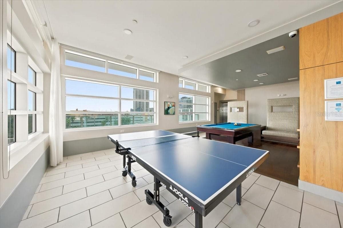 Dedicated billiards area provides a fun recreational amenity. - 111 N 12TH ST #1704, TAMPA