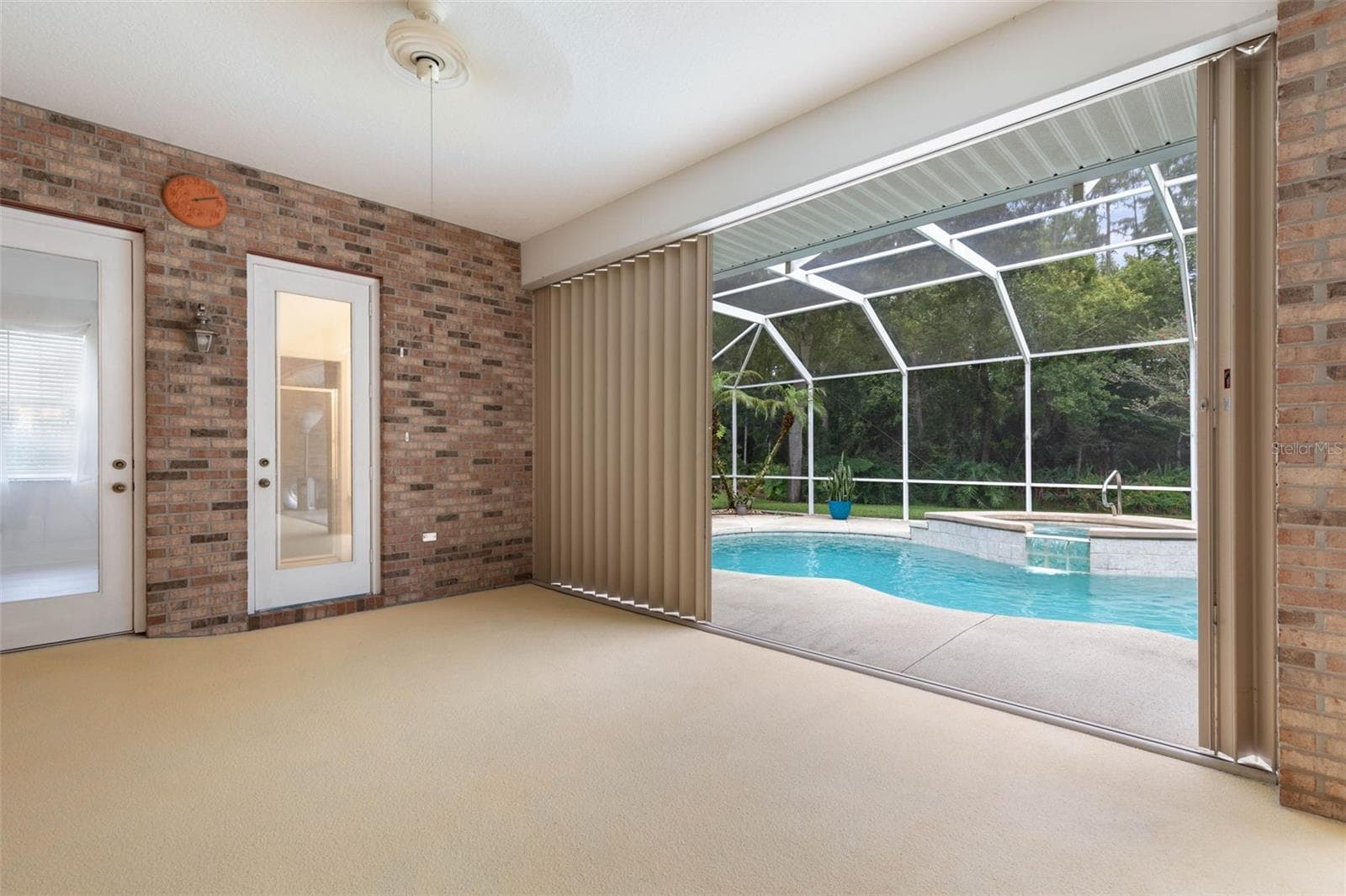 Storm shutters for Lanai - 47 CAMBRIDGE TRCE, ORMOND BEACH