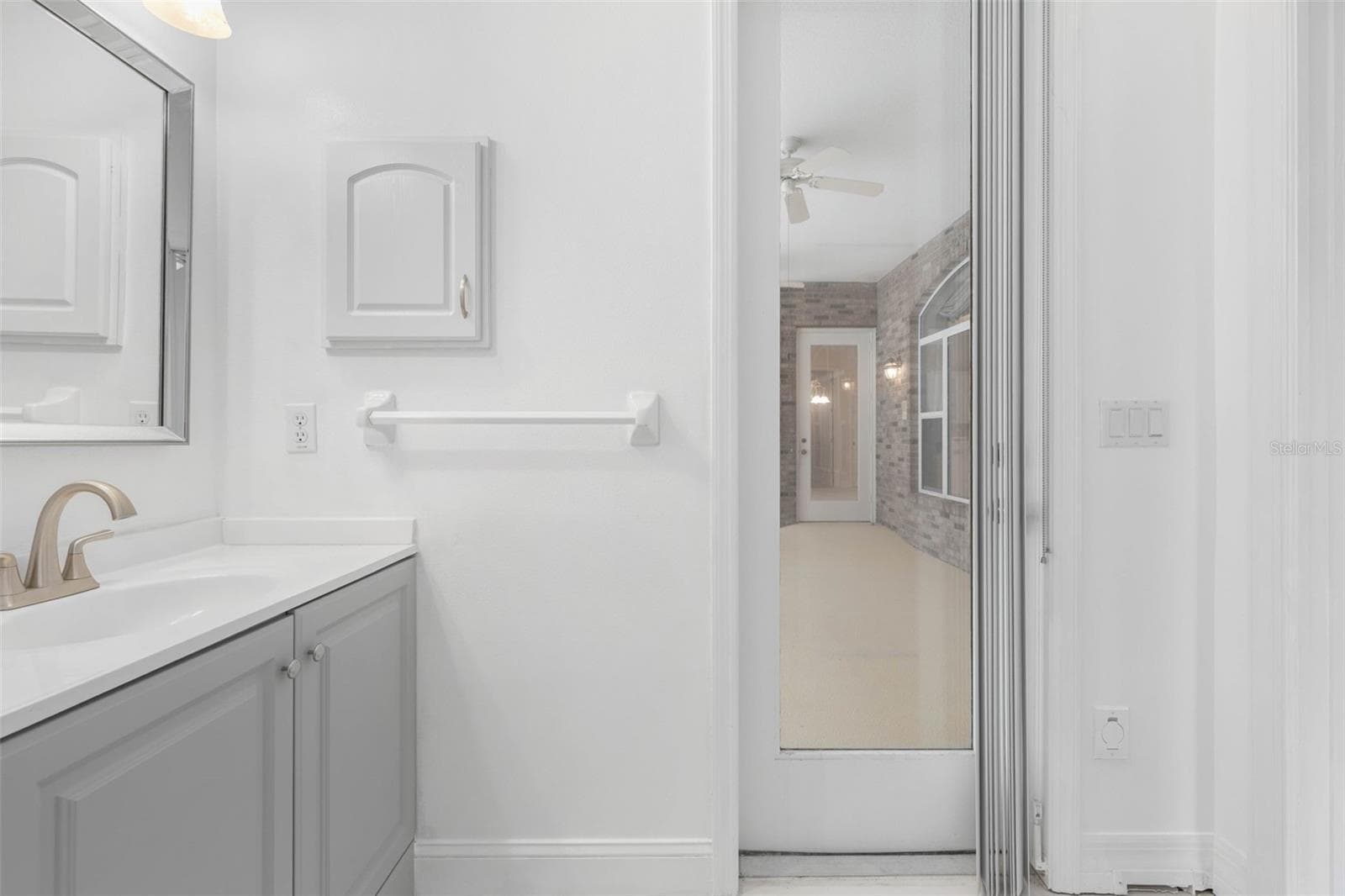 Guest bathroom 3-Access to Pool - 47 CAMBRIDGE TRCE, ORMOND BEACH