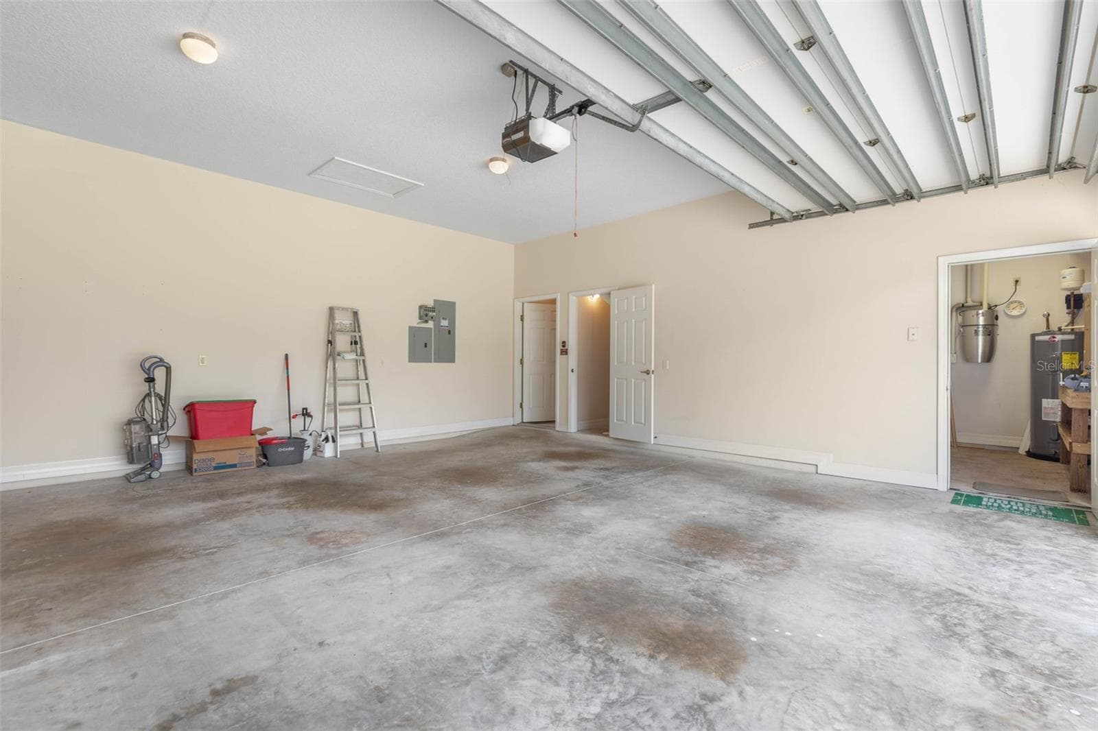 Oversized Garage with Workshop and Storage - 47 CAMBRIDGE TRCE, ORMOND BEACH