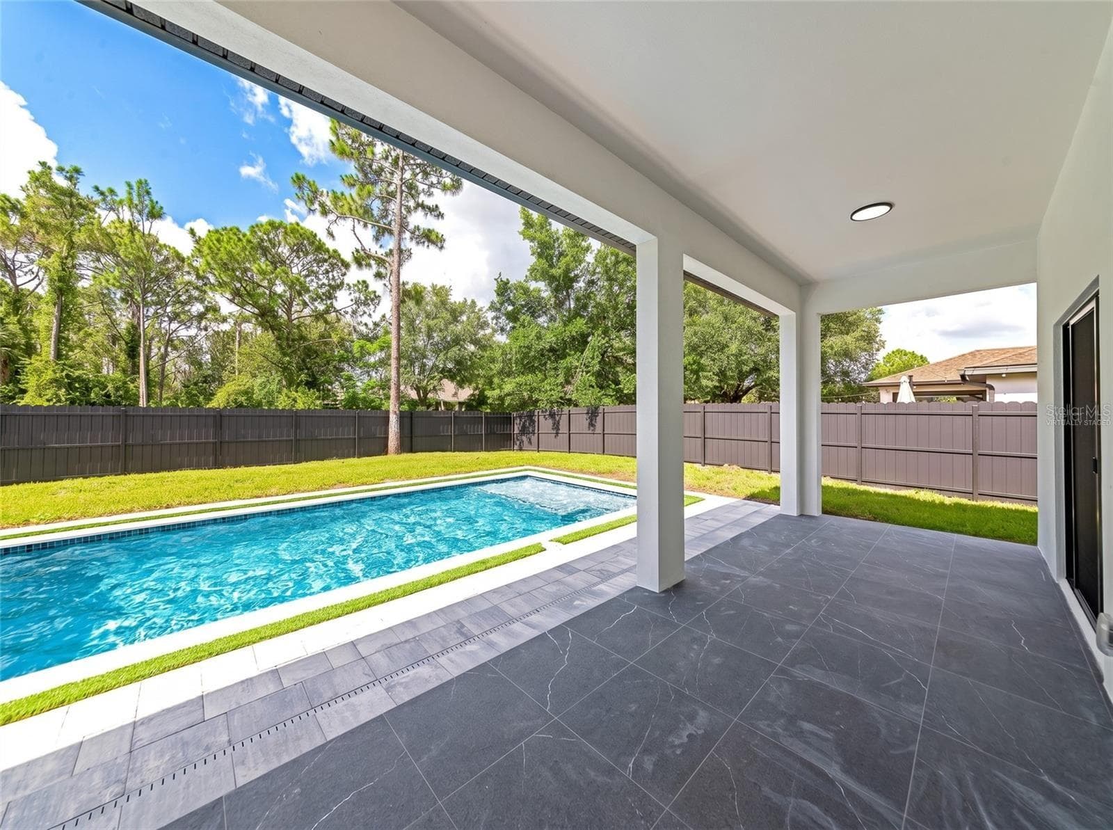 Virtually Staged with a Pool - 7511 BLUTTER RD, NORTH PORT