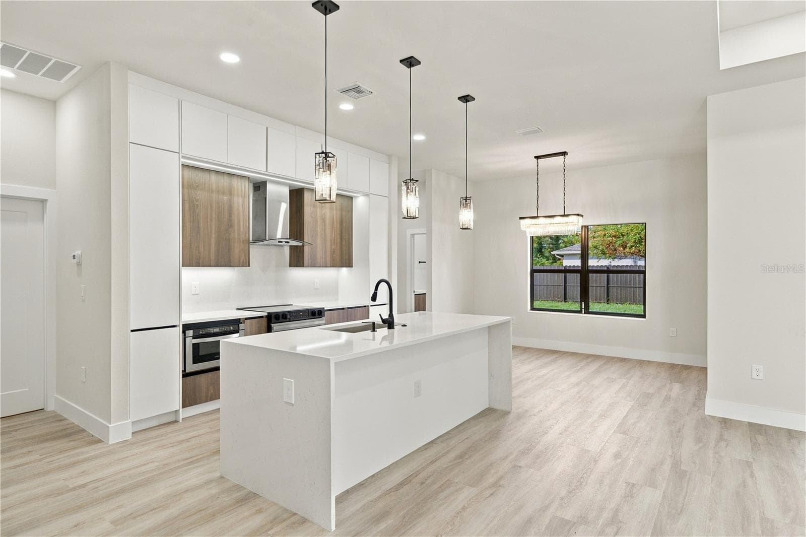 Island with room for Bar Stools - 7511 BLUTTER RD, NORTH PORT