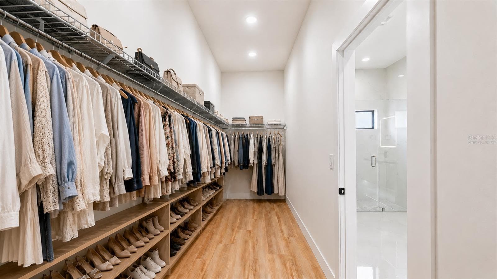 Virtually Staged Walk-In Closet - 7511 BLUTTER RD, NORTH PORT