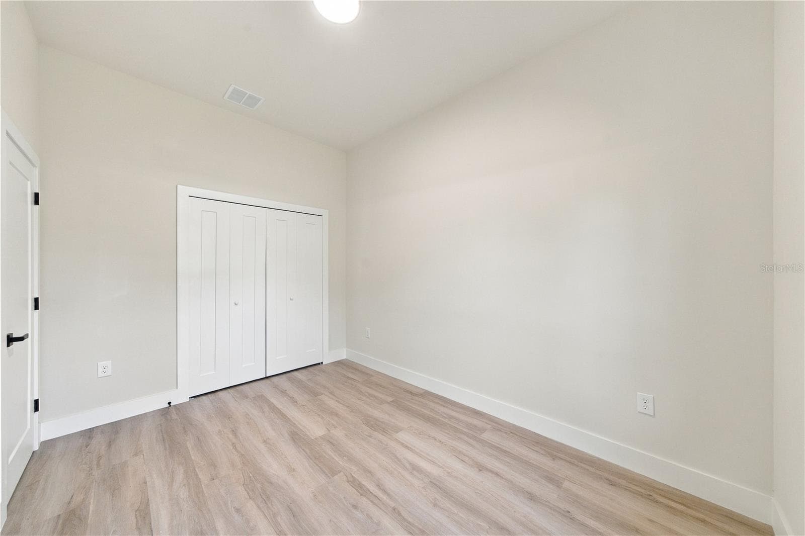 Bedroom 2 with built-in Closet - 7511 BLUTTER RD, NORTH PORT