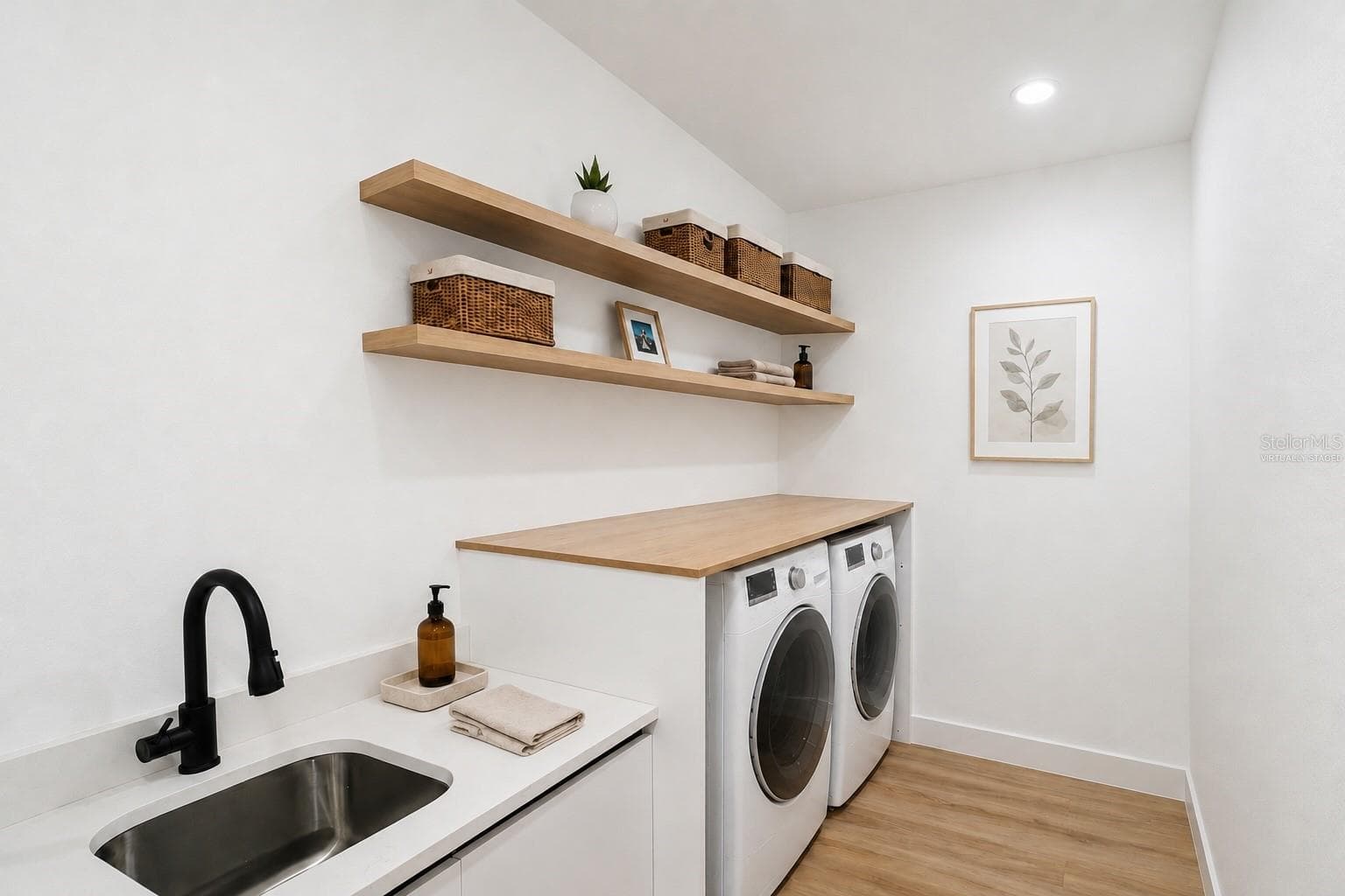 Virtually Staged Laundry Room - 7511 BLUTTER RD, NORTH PORT