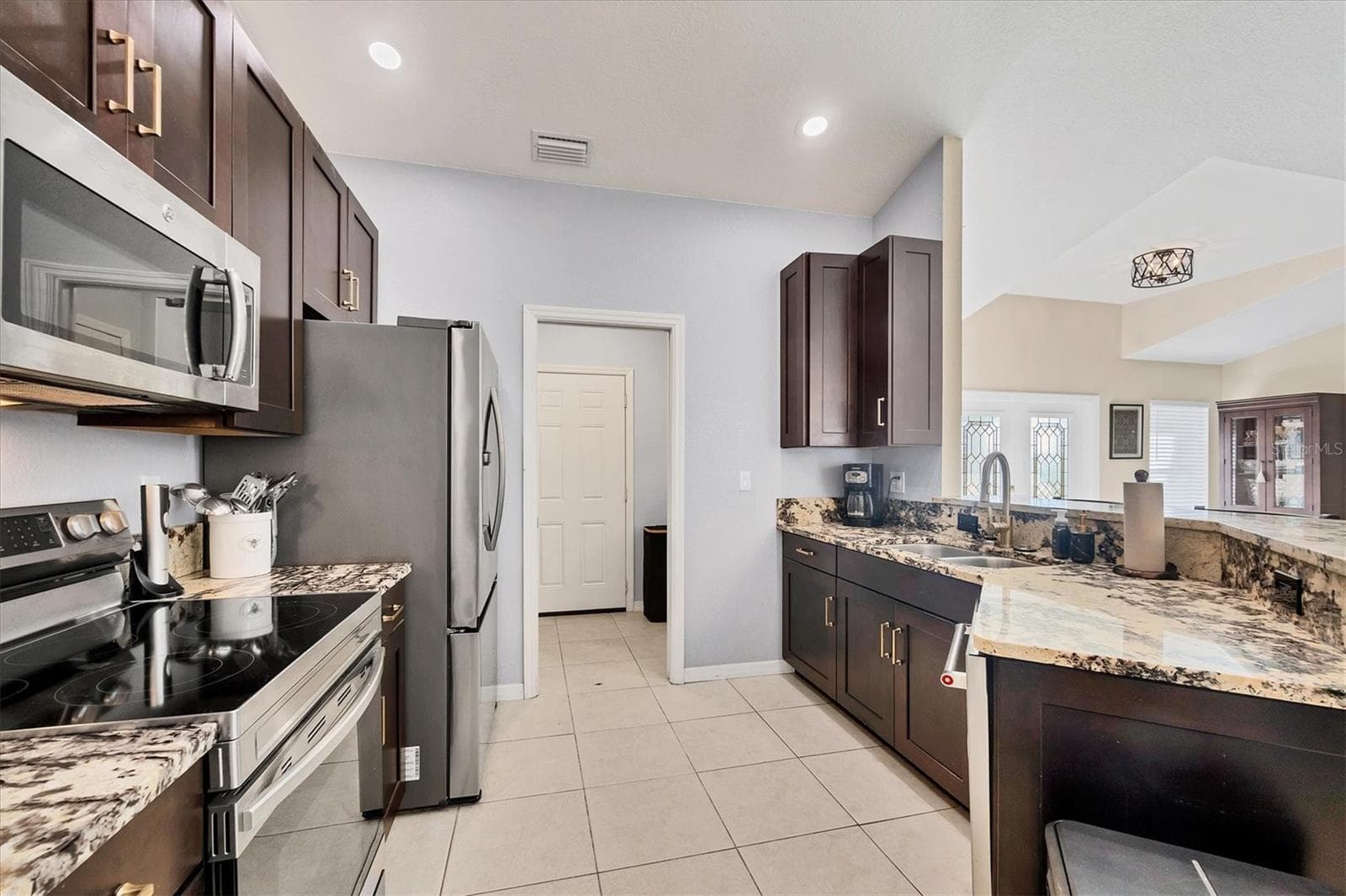 Single Family Residence at 10039 SUNDAY DR, PORT CHARLOTTE, photo 9 of 32