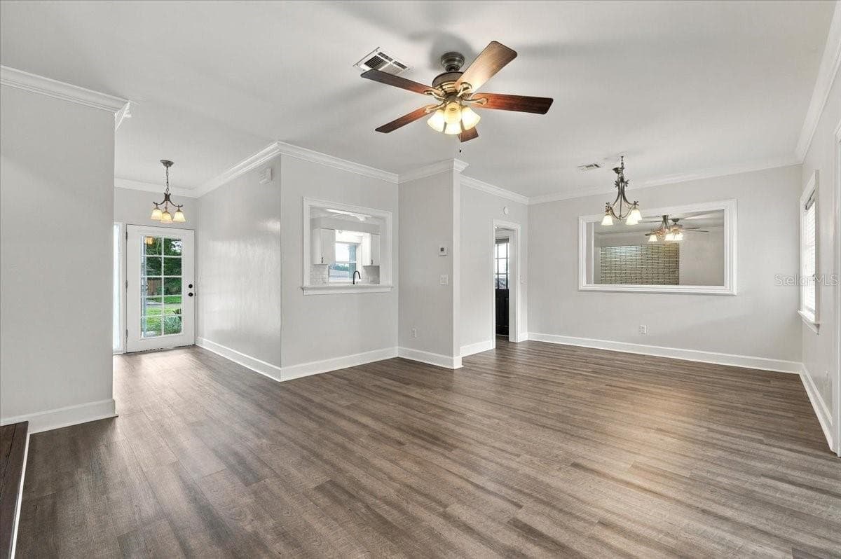 Dining Room/Living Room Looking to Foyer - 950 14TH ST NE, WINTER HAVEN