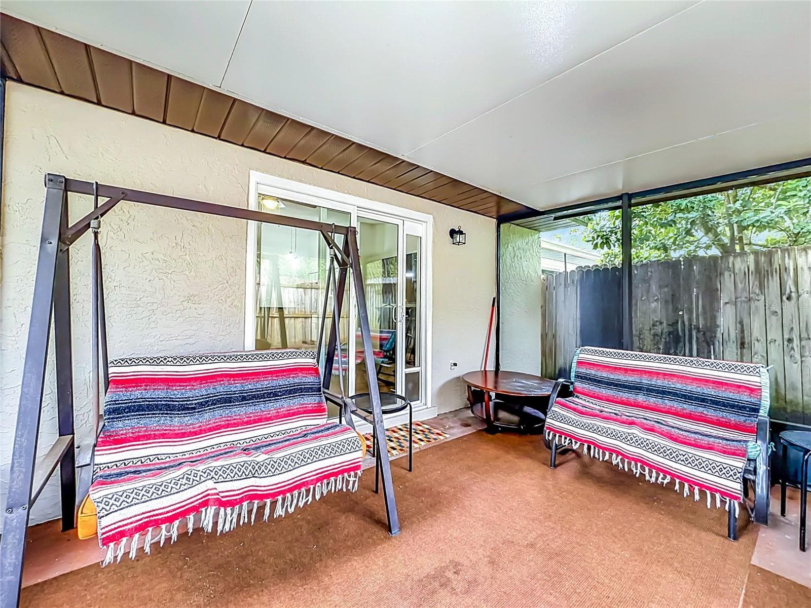 Covered and Screened Porch, fenced for complete privacy. - 107 LONG LEAF PINE CIR, SANFORD