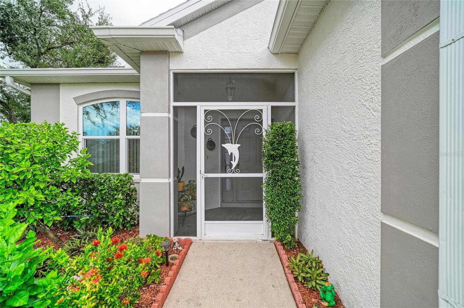 Charming, screened front entry way to personalize - 1101 CANE MILL LN, BRADENTON