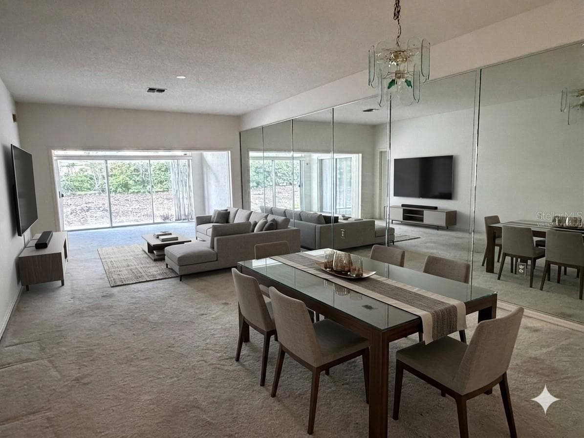 Virtually Staged Living/dining combo - 1 ENCLAVE DR, WINTER HAVEN