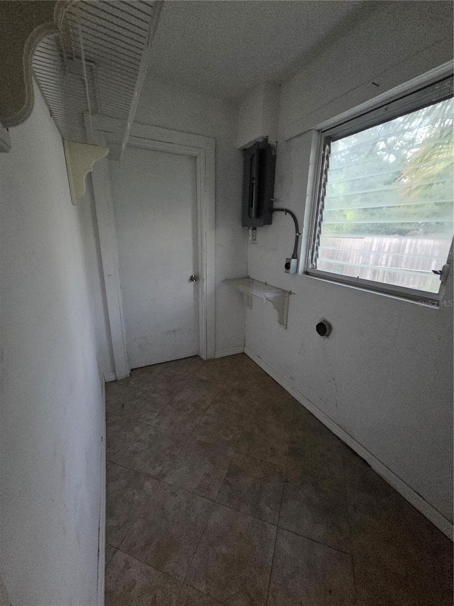Laundry room with door to garage - 350 N LEVIS AVE, TARPON SPRINGS