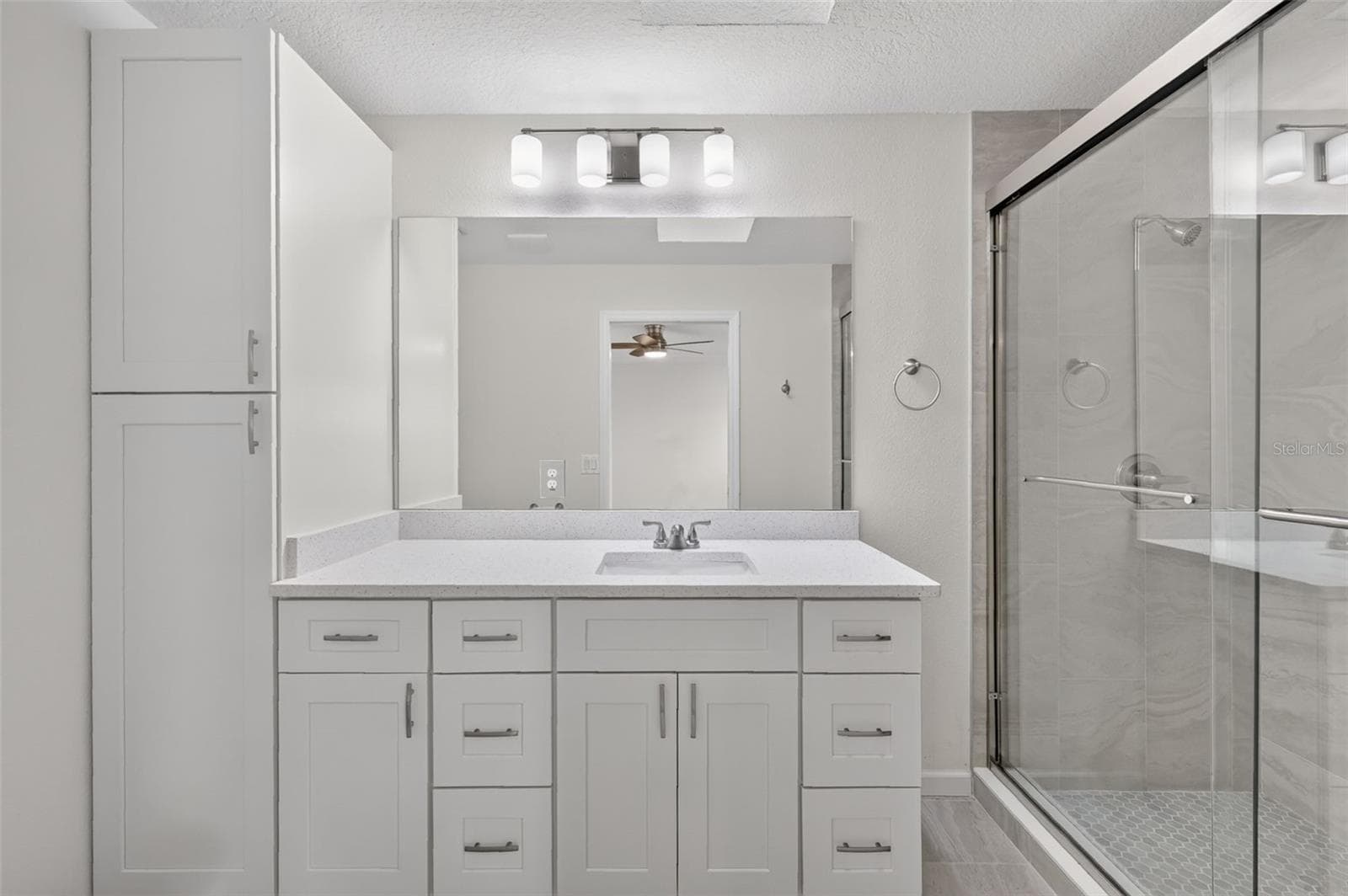 DOUBLE PRIMARY BATHROOM WITH WALK-IN SHOWER, AND PLENTY OF CABINET SPACE - 11041 SE 174TH LOOP, SUMMERFIELD