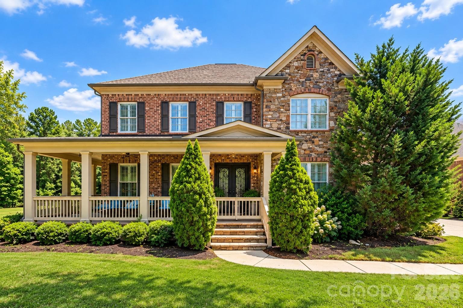 Beautiful full brick and natural stone home with wraparound front porch - York