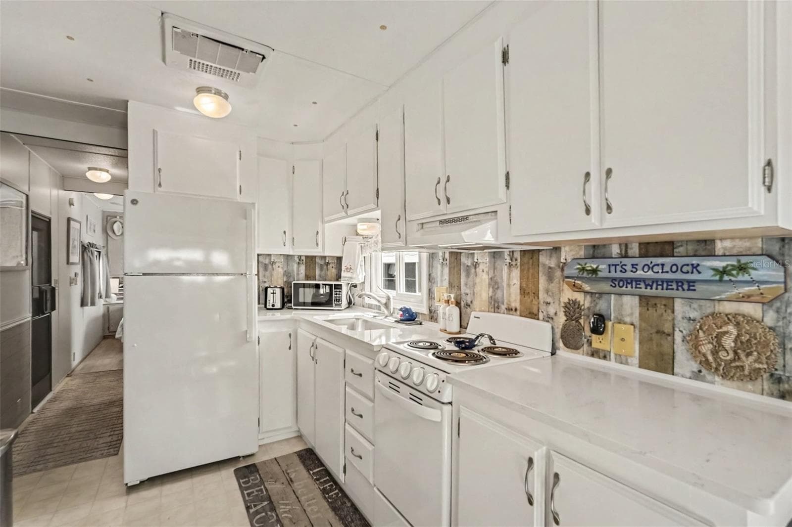 Manufactured Home at 616 PIER LN, MELBOURNE BEACH, photo 9 of 29