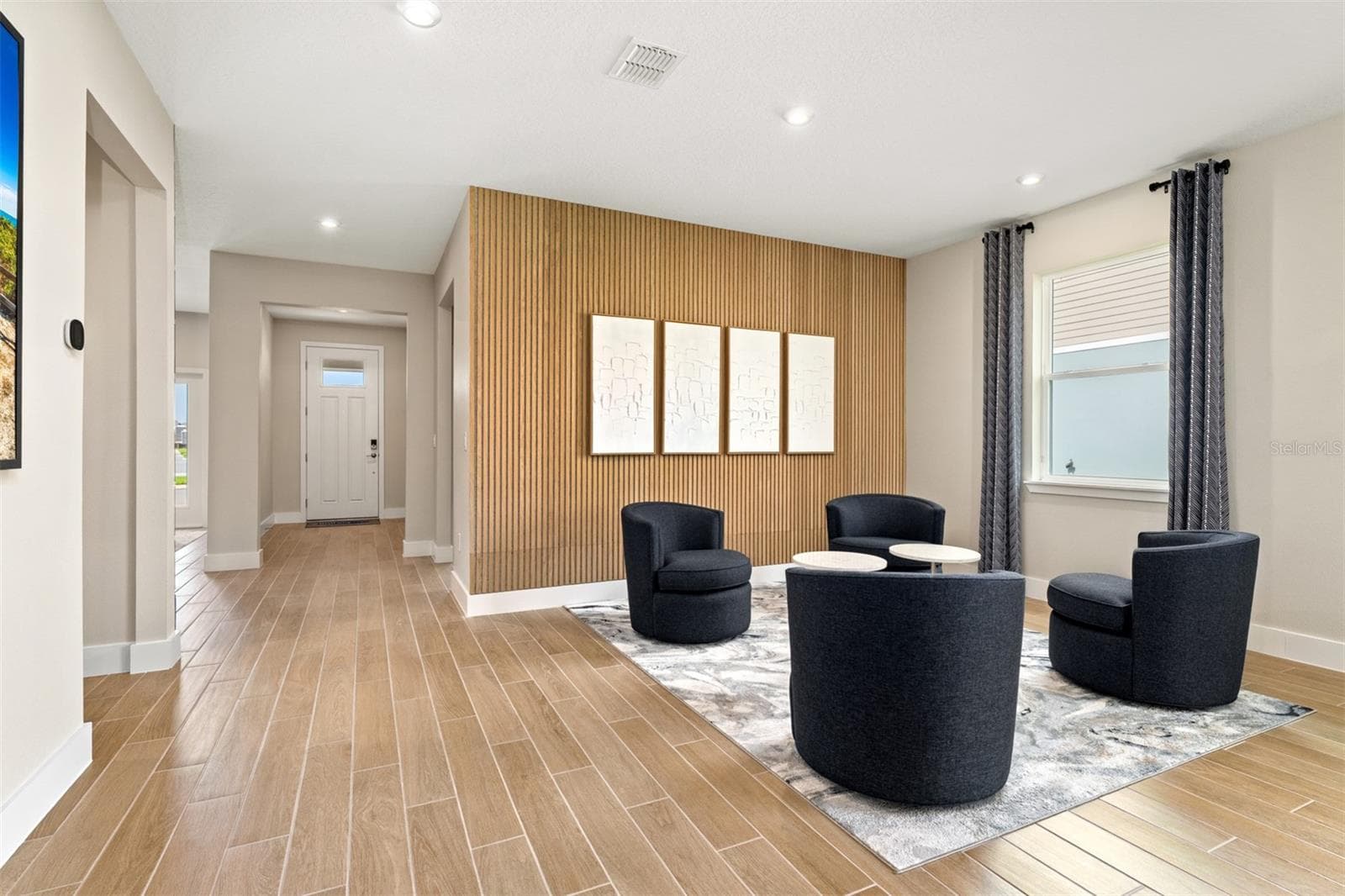 Rainwood Pinnacle Model Great Room - 370 FREE RANGE DR, GROVELAND