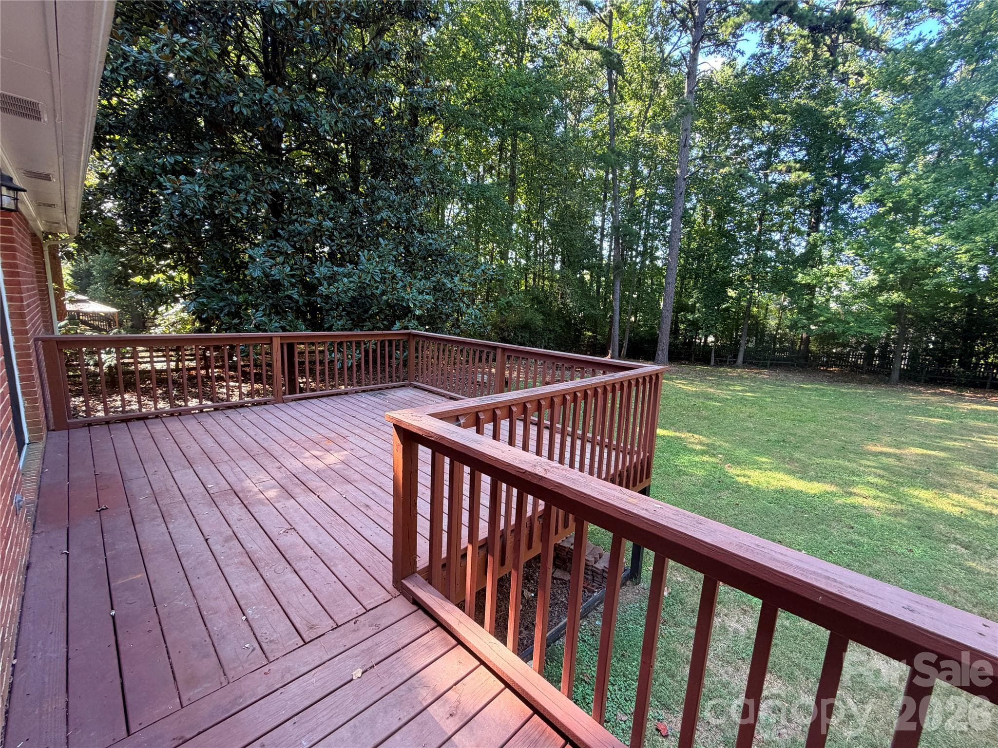 Spacious back deck extends from the rear hallway to the kitchen. - 248 Hillcrest Avenue, Rock Hill