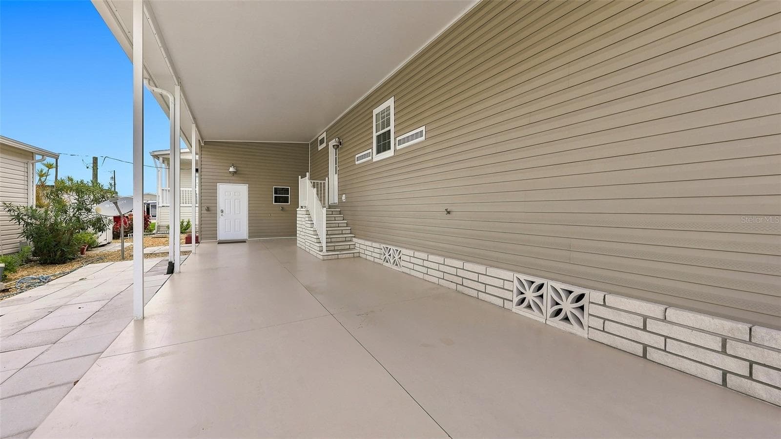 Attached storage room at far end of carport - 10315 CORTEZ RD W #2F, BRADENTON